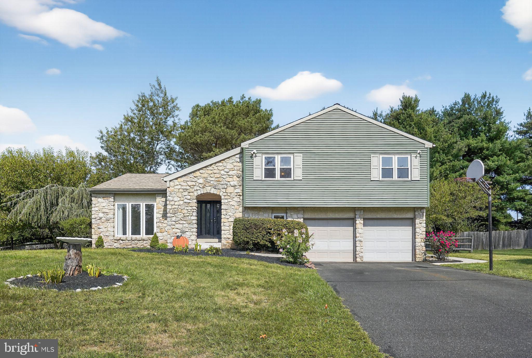 Come see this updated home in a beautiful neighborhood located in Upper Gwynedd. As you enter the grand foyer your eye will notice a vaulted ceiling with a new chandelier and new flooring while catching a stunning view of the backyard. To your left is a large living room with brand new carpeting and an open concept to the dining room. The eat in kitchen has two beautiful skylights, new stainless steel appliances, new flooring, new paint, and updated recessed lighting. Sit at your kitchen table and see all the varied beautiful birds that come visit in the tree right outside your bay window. From the kitchen you enter your spacious family room with a full stone wall wood fireplace. This room feels so warm and cozy which includes new recessed lighting and painting. There is a new half bath with new vanity, floor, toilet, light and paint. There is a sliding glass door that leads to a patio and a large gazebo where you can sit and have a quite lunch with friends and family. The backyard includes a sizeable shed and is entirely fenced in. The upstairs boasts a sizeable master bedroom with new carpeting, new recessed lighting, two closets, newly painted and a en-suite which has a large tub, shower with new shower head and door, double vanity with a new light fixture. The other three bedrooms are spacious with new carpeting and have been newly painted. The hall bath has been completely redone with new tile flooring, new double vanity, new light, new mirrows, new toilet, and a new tub. It looks stunning! There is a two car garage which has been recently painted. The entire inside of the home has been repainted along with a new roof, new ac, and a new hot water heater. This home is close to shopping and restaurants. Just bring your furniture and this home is ready to go. Schedule your appointment. You do not want to miss out on this one.