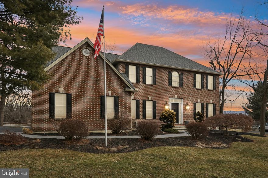 Resting on almost half an acre, this classic brick Colonial boasts timeless appeal. Recent updates include, new roof, siding, gutters, deck, & water heater. Located in the sought-after subdivision "The Woodfields", this home offers more than just a place to live, it’s a lifestyle. Minutes from The Promenade Shops at Saucon Valley, where high-end dining, shopping, & live entertainment create a vibrant atmosphere, this home is also close to parks, walking trails, and golf courses. Downtown Bethlehem, with its historic charm, lively festivals, and acclaimed restaurants, is just a short drive away, while Lehigh Valley International Airport ensures seamless travel, & I-78 provides easy access to hospitals and universities. Inside, hardwood floors, high ceilings, open concept, create an inviting space. A chef’s dream kitchen features a Wolf stove, a center island, w/ a breakfast area opening to the new deck overlooking the backyard. The sunken family room, w/ a cathedral ceiling & brick fireplace, adds warmth and charm. Upstairs, the primary suite offers hardwood floors, walk-in closet, and an ensuite bath w/ a double sink & stand-up shower. The junior suite includes a spacious walk-in closet, while two additional bedrooms & a full bath w/ a double sink complete the second floor. The lower level adds living space or storage. Whether unwinding on the deck, cozying up by the fireplace, or exploring all the area has to offer, this home places you at the center of it all. Open House Canceled. Under Agreement