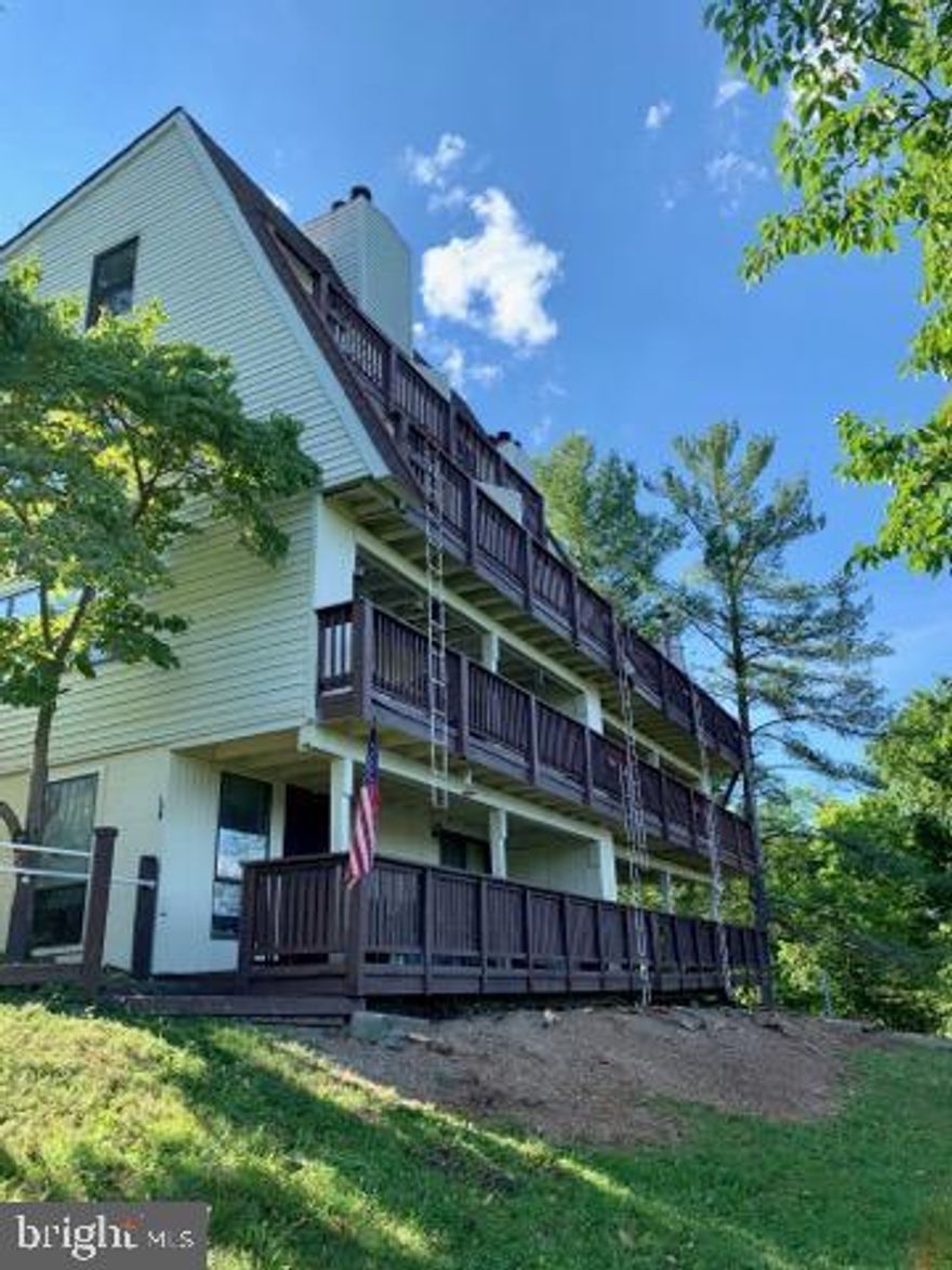 What a great opportunity to own a condo near Bryce Resort with views of Lake Laura. This first level condo is on the top of the hill which offers a great scenic of both Lake Laura and mountains. 

The condo, fully updated in 2020,  has 1 Bedroom, 1 full bathroom with wood walls, a wood burning fireplace and an open layout from the Kitchen/Dining/Living Room. Kitchen has new cabinets, appliances and granite countertop. Whole unit was remodeled in 2020 and has brand new flooring. This skillfully furnished unit comes with everything you see in the pictures, including the TV! 

The Large Deck area boasts 180 degree views and has storage for some outdoor essentials. A short walk down the street and across the dam leads you to Lake Laura and it's only 2 miles from the ski slopes and other amenities Bryce has to offer! Make this the perfect get-a-way with the best updates in the neighborhood.