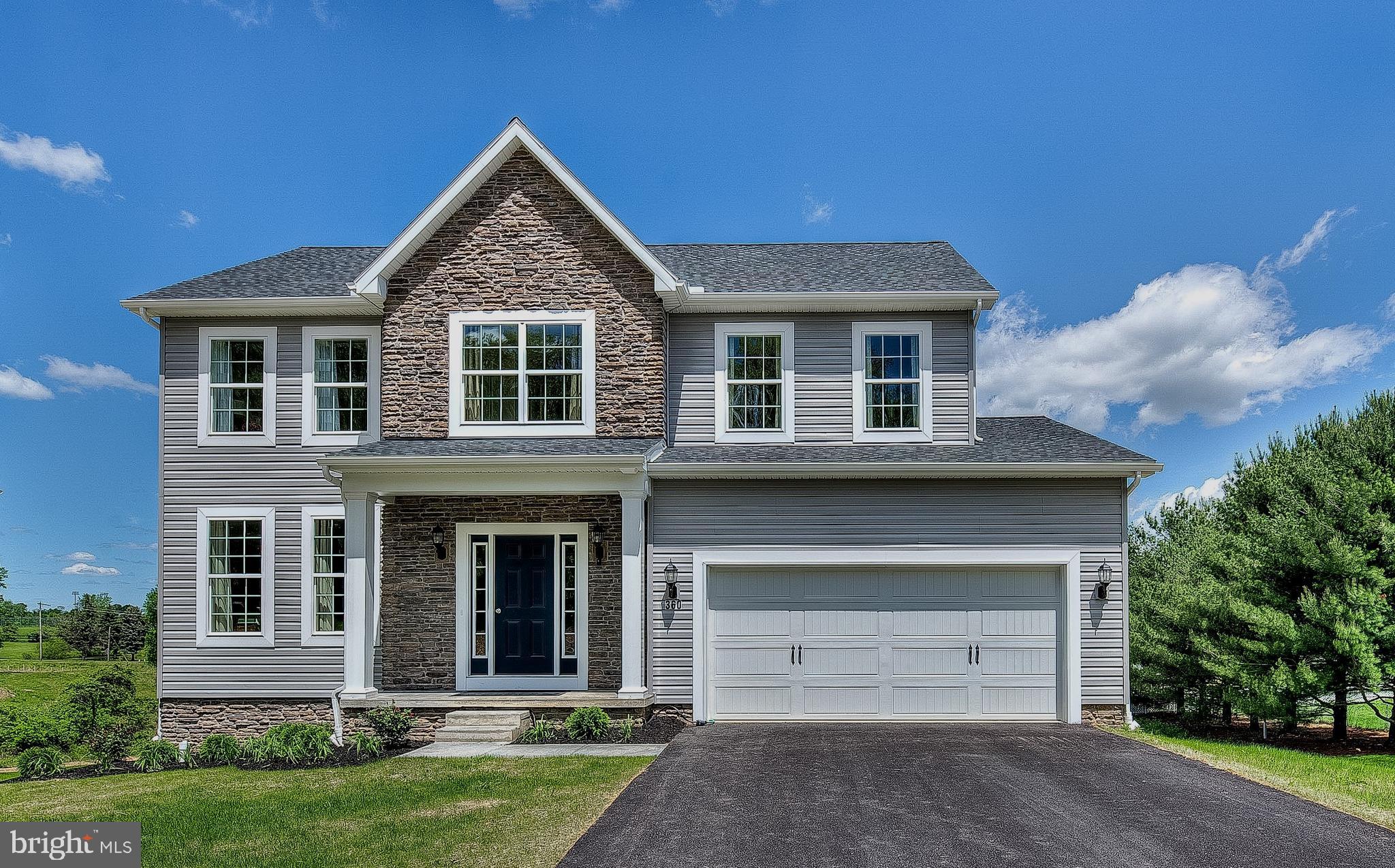 ***TO BE BUILT*** *****SPECIAL INCENTIVE MAY BE AVAILABLE***** ***10K TOWARDS CLOSING COSTS OR OPTIONS IN THE HOME WITH USE OF PREFERRED LENDER & TITLE***
The Oakmont is a home for everyone and anyone. The first-floor living areas are smartly divided into formal and informal settings by the impressive open stairway and Georgian-style center hall. Beyond the hall is a wonderful farm-style kitchen and casual family room. In warm weather, this family gathering area can be expanded to an optional deck. A separate dining room and adjacent living room provide a pleasant space for more sophisticated entertaining. In the Oakmont, teens can congregate in the family room, totally separated from their parents who are relaxing with friends in the living room. Upstairs are four large bedrooms, three of which share a well-designed bathroom and open into a central hallway, aiding traffic flow on those hectic weekday mornings. The fourth, a master suite with a luxurious corner soaking tub, is tastefully secluded and large enough to include a sitting area or study. A large family, with children of various ages, can live comfortably in the Oakmont. Its classic exterior charm will complement any neighborhood. Incentives may be available with use of Builder Preferred Lender and Title Company.
*The first floor of this OAKMONT is enlarged with a 2' rear bump out to span the entire back of the house. The garage also has a 2' front extension. The crawl space will be excavated to provide a larger basement space. Many options included in this to be built Oakmont!!