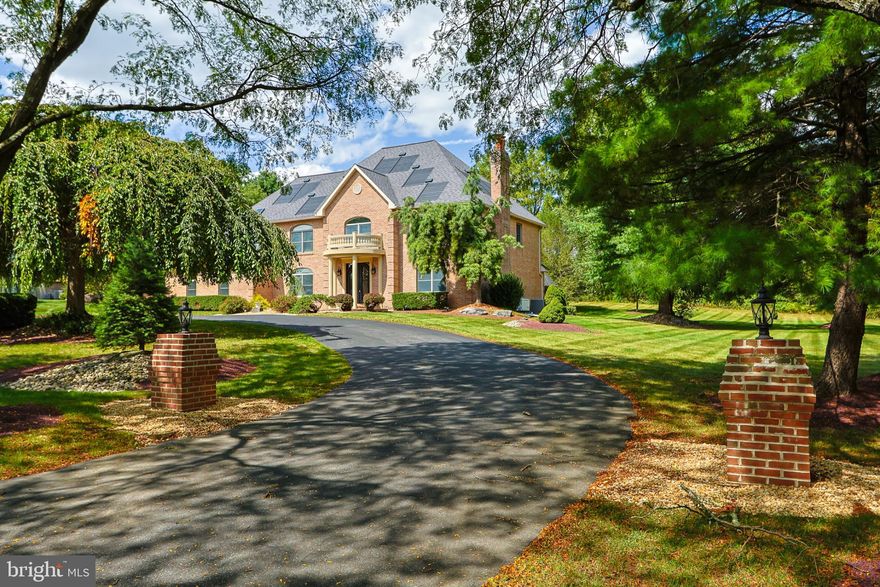 Welcome to this stunning, completely remodeled brick residence offering over 6,000 square feet of luxurious living space in one of the area’s most exclusive neighborhoods. Set on more than an acre of private grounds, this home combines timeless elegance with modern sophistication—perfectly situated with convenient highway access for an easy commute to New York or throughout New Jersey. Inside, you’ll find five spacious bedrooms and four-and-a-half beautifully appointed bathrooms, including a first-floor suite ideal for guests or multigenerational living. The home has been meticulously updated throughout, showcasing custom walk-in tiled showers, quartz countertops, designer lighting fixtures, and new flooring in every room. The chef’s kitchen and open living spaces are designed for both everyday comfort and elegant entertaining. Two fireplaces, both completely updated, bring warmth and character to the main living areas, while expansive windows invite in natural light and showcase the home's elegant finishes. A fully finished lower level adds endless possibilities—whether for a home theater, gym, or recreation area. Outdoors, the expansive property with a outdoor gazebo offers rare privacy and space, making it perfect for gatherings or quiet relaxation. This exceptional home delivers the ultimate combination of size, style, and location—an opportunity not to be missed.