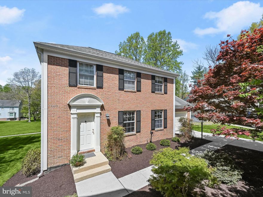 Beautifully Updated 4 bedroom, 3 bath Colonial in Ellicott City's Sought-After Dorsey Hall community. 
Nestled on a quiet cul-de-sac in Ellicott City's desirable Dorsey Hall community, this beautifully maintained Colonial offers an open-concept layout, a finished walkout lower level, and numerous updates throughout that include the water heater (2016), HVAC (2022), siding (2018), sliding doors, and roof (2007). The renovated kitchen is a chef’s delight, featuring granite countertops, rich wood cabinetry, a peninsula island, stainless steel appliances—including a new refrigerator and microwave—and an inviting breakfast area.  Sunlight fills the main level, where spacious living and dining rooms each offer French doors that open to an expansive deck—perfect for indoor-outdoor entertaining. Upstairs, the primary suite boasts a walk-in closet and a private bath with a stall shower. Two additional bedrooms and a full hall bath complete the upper level.  The walkout lower level features a cozy family room with a wood-burning fireplace set in a brick and wood accent wall, a fourth bedroom, full bath, and ample storage space. Enjoy outdoor living on the shaded patio and large deck overlooking open views and scenic hiking trails.  Conveniently located close to major commuter routes, shopping, dining, and entertainment—this home truly has it all!.
