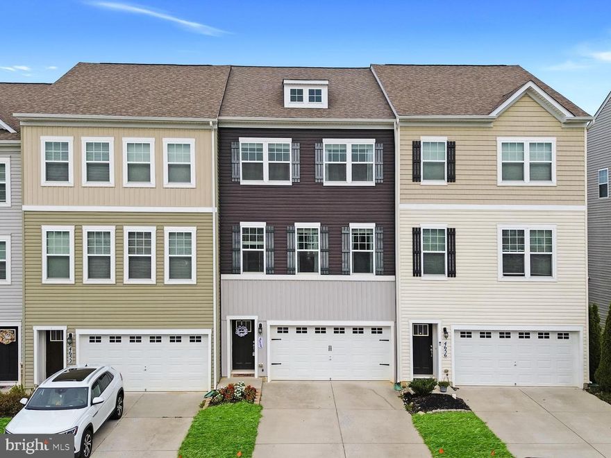 Available immediately! Nestled in the highly sought-after Manors at Ballenger Creek, this stylish and spacious three-level townhouse offers an open and modern layout on a premium lot. You’ll immediately appreciate the hardwood flooring and soaring 9-foot ceilings throughout the main level, leading into a chef’s kitchen equipped with stainless steel appliances—including a gas range—granite countertops, an expansive granite island, and a large space for a table perfect for entertaining or casual dining. Walk-out from the kitchen to the spacious deck. The master bedroom is a serene retreat with its own ensuite bath and large walk-in closet. The upstairs laundry room adds ease to everyday living. The upper-level is completed by an additional hall bathroom and two additional bedrooms. The finished lower-level family room opens to a patio, making the home ideal for indoor/outdoor gatherings. The two car garage provides ample parking and space for storage. The outdoor space, including the rear deck, patio, and fenced backyard make this home perfect for relaxing or hosting friends. With nearby parks, trails, shopping, dining, and commuter routes, this low-maintenance home is truly move-in ready—just unpack and start enjoying.