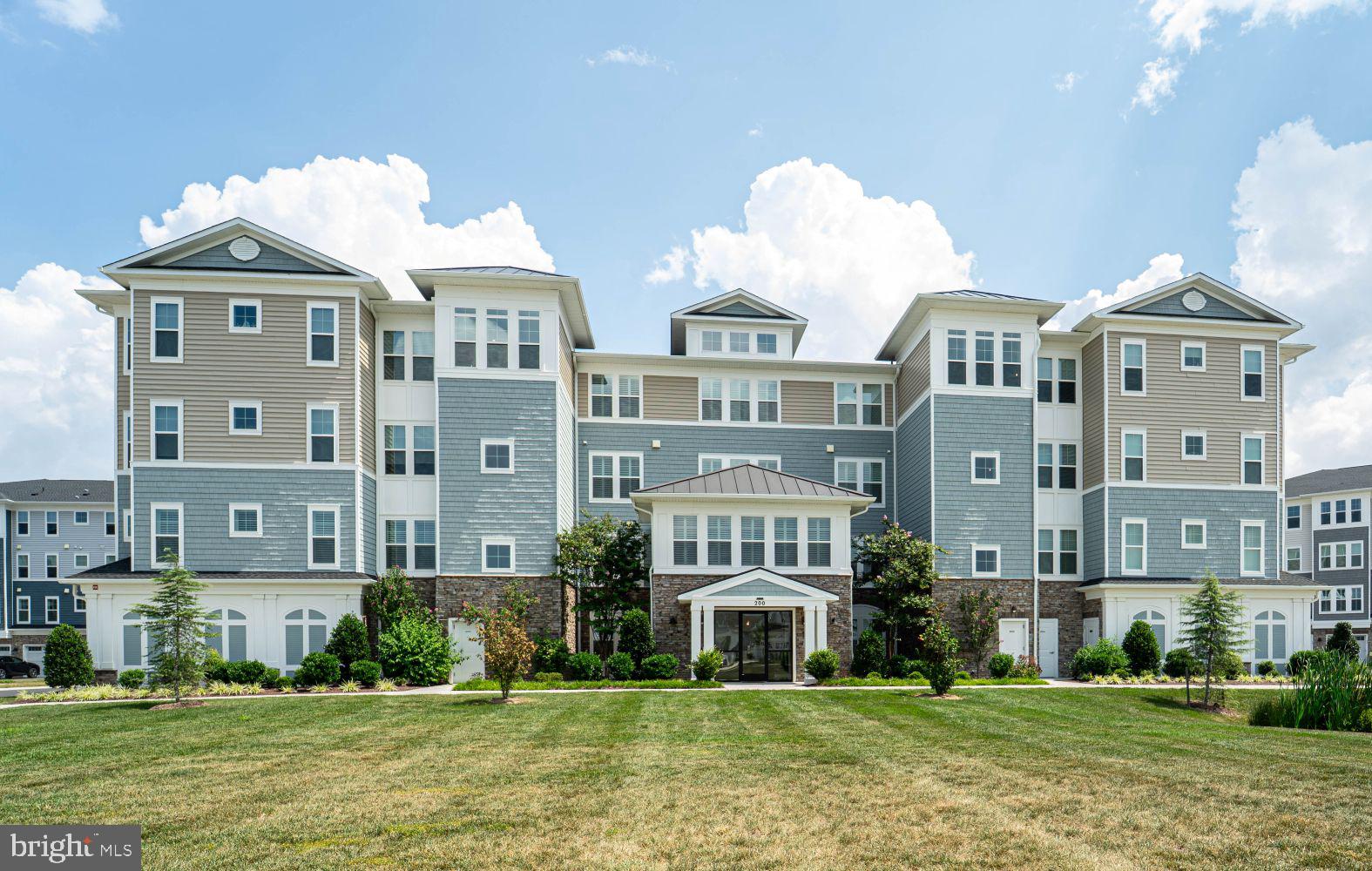 Welcome to Luxury Condo Living at The Four Seasons at Kent Island, An active 55+ Community packed with tons of amenities . Move -in to this turn key luxury condo with plenty of natural light with "Perfect Fit" planation shutters and ample privacy on all windows and doors. The kitchen has a gourmet package including quartz countertops and a large island with space for barstool eating, subway tile backsplash, staggered cabinets, and stainless steel modern appliances. The great room has a seasonal view of the Chester River and a traditional electric fire place with shiplap accents fostering a feeling of warmth and tranquility. The primary bedroom/bathroom is spacious with two sizeable walk-in closets. The primary bedroom also includes attached sitting room with water-view and access to the balcony overlooking a pond that attracts wildlife. All bedrooms of this Severn Model offer custom closets designed and constructed by "Chesapeake Closets". The unit comes with a first floor assigned one car garage and an assigned climate-controlled storage closet. Come join the easy life! Call for your private showing!