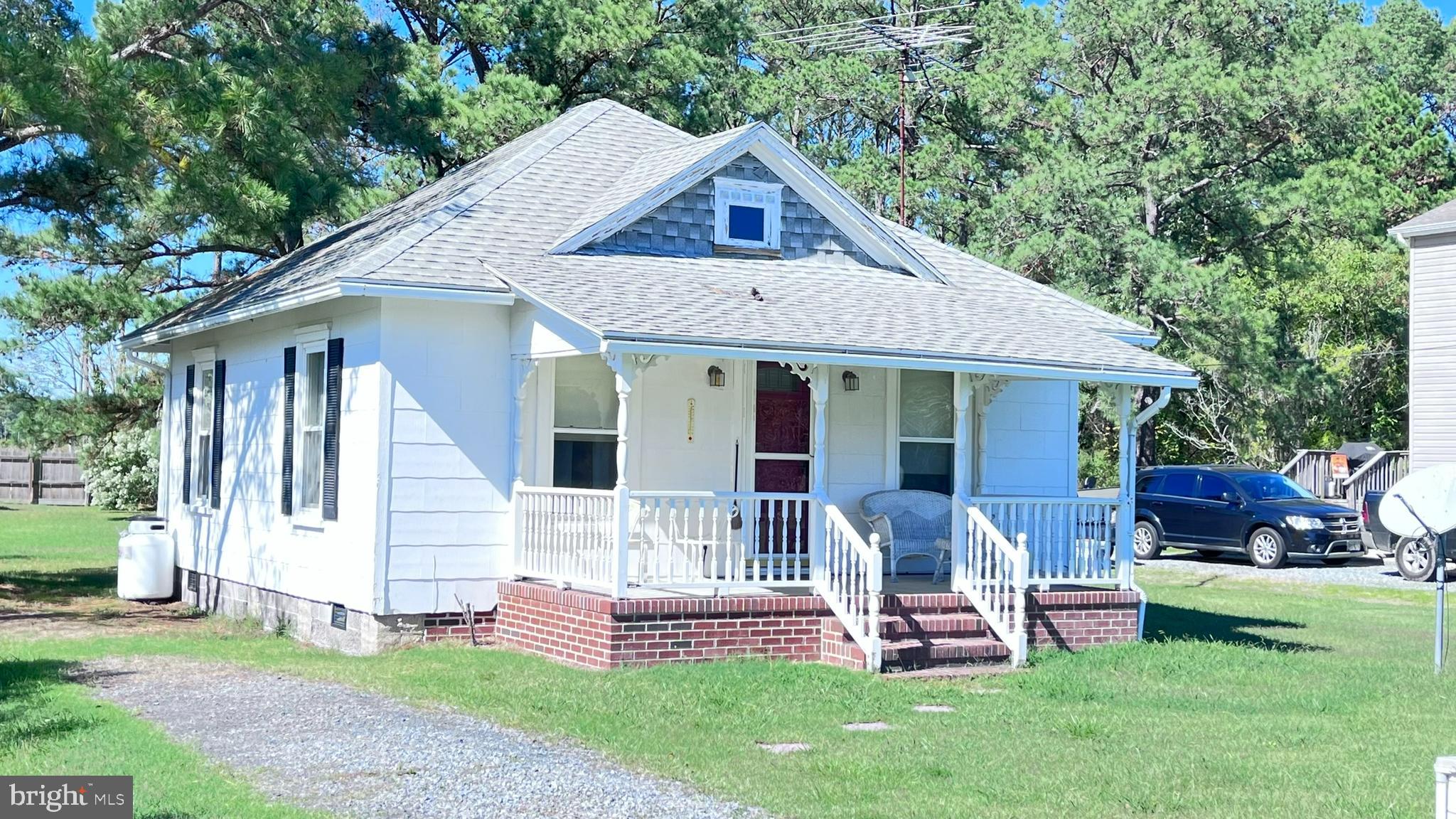 Nestled in the small community of Thomas in the Neck District, this quaint cottage style home can be yours to enjoy as year-round residence, vacation rental or your own seasonal getaway.
Only only a mile from public ramp and marina, steamed crabs and a General Store/Restaurant.
Recent addition in rear of home created more space for a modern bathroom, utility room and closet or breakfast suite and storage space.
A 2 ton mini-split system with interior 12,000 BTU units were installed approximately 4 years ago.
All appliances are 10 years or less.
Original section of roof was totally replaced approximatley 20 years ago. The attic is well insulated making it perfect for extra storage.
Gutters have been cleaned annually.
Propane cook stove cost are less $100 annually.
Ample backyard has cement pad approx. 8'x8' suitable for mower storage shed or BBQ lounging area.