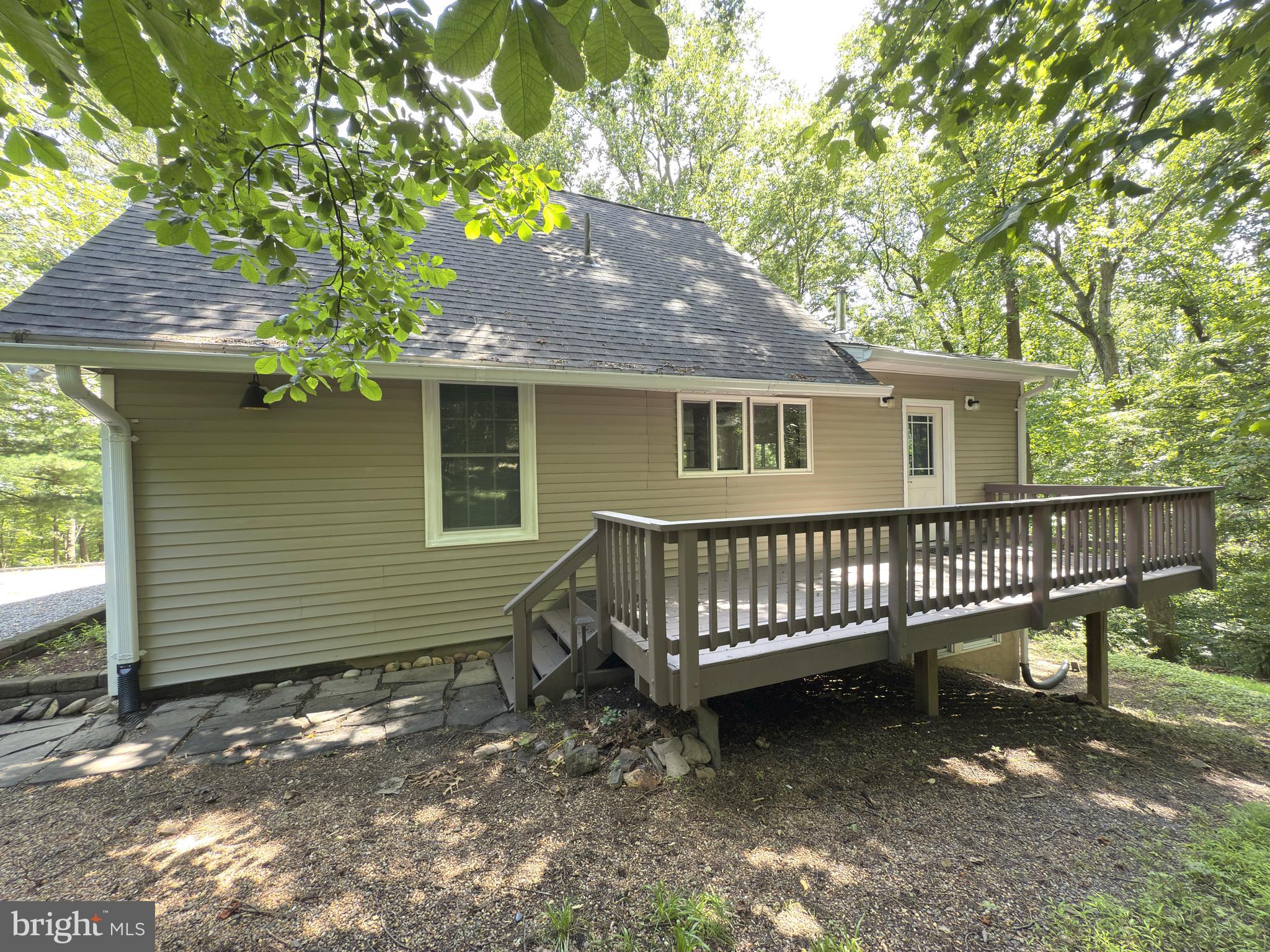 Tucked Into The Rolling Foothills Of Virginia’s Blue Ridge Mountains, This Warm And Inviting Chalet-Style 3 Bedroom 2 Bath Home Offers A Peaceful, Nature-Rich Lifestyle — Just Minutes From The Conveniences Of Town, But A World Away In Feel. Set On A Private, Wooded 0.29-Acre Lot With Access To The Shenandoah River, 132 Pine Crest Lane Is A Rare Haven For Families Seeking Both Serenity And Comfort. An Additional Lot Is Included In The Sale - LOT 42 BL 1C SEC 1. This Property Offers The Perfect Mix Of Privacy, Natural Beauty, And Thoughtful Updates. From The Cozy Warmth Of The Wood Stove To The Peaceful Decks Surrounded By The Forest. Every Corner Of This Property Invites Your Family To Slow Down, Spend More Time Outdoors, And Build A Life Rooted In Comfort, Connection, And Adventure. This Property Has Been Renovated Through Out With Updated Kitchen, Main Level Full Bath And Living Area With Two Decks Overlooking The Woods. Private Upper Level Master Bedroom With Walk In Closet, Finished Walkout Basement And A Shed For Extra Storage. Recent Updates Include - 2021 – Main Roof Replaced; 2022 – Water Heater Replaced; 2025 – Lower Roof Replaced; 2025 – Septic System Repaired; 2025 – Radon Mitigation System Replaced; 2025 – Gutters Replaced. Whether You're Hiking The Appalachian Trail, Paddling The River, Or Simply Enjoying The Quiet Sounds Of Nature From Your Own Deck, This Home Offers A Lifestyle Where Your Family Can Grow, Explore, And Create Lasting Memories In Every Season. Minutes To Route 7, Berryville And Western Loudoun.