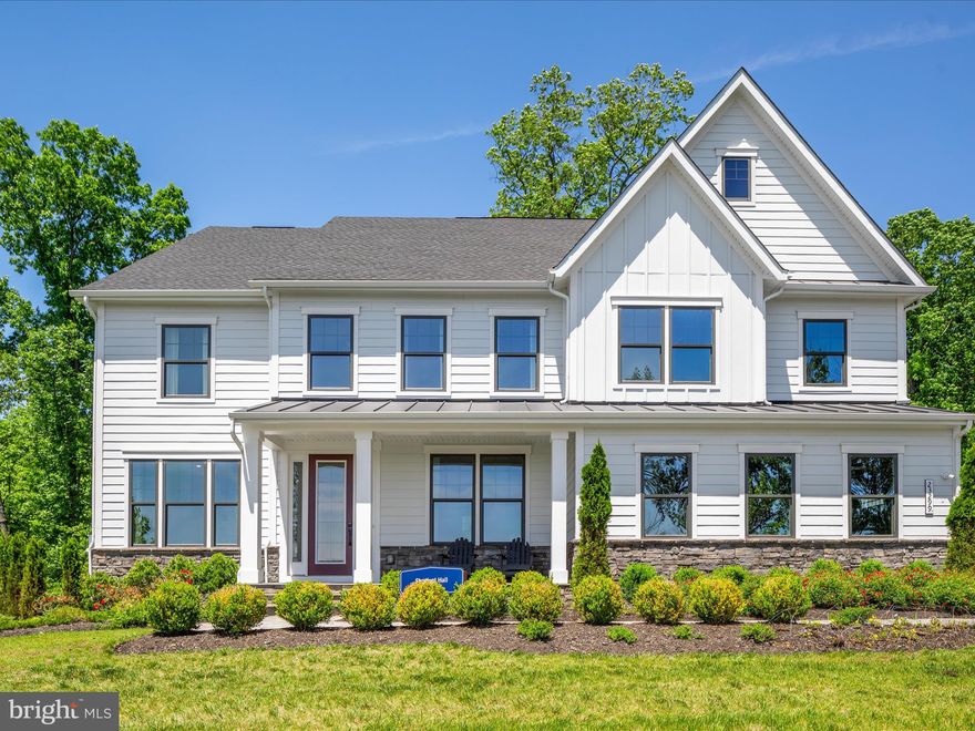 Open Houses Saturday and Sunday 12-2! Step into a world of unmatched luxury and comfort with this extraordinary NV Homes Stratford Hall model home, nestled in the prestigious Hartland community of Aldie, Virginia. This isn't just any home—it's a sanctuary, a haven where every moment is infused with elegance and sophistication.

Let's start with the kitchen. Marble countertops, stainless steel appliances—this isn't just a space for cooking, it's a culinary oasis. Imagine the joy of whipping up your favorite meals in this gourmet paradise, surrounded by the finest finishes and top-of-the-line amenities.

Now, let's talk about the family room. With its soaring ceilings and floods of natural light, this is where memories are made. Whether you're cozying up by the fireplace on a chilly evening or basking in the warmth of family togetherness, this is the heart of the home.

And don't even get me started on the primary bedroom. Spacious, cozy—this is your personal retreat, a place to unwind and recharge after a long day. With ample closet space and a luxurious ensuite bathroom, every detail has been carefully crafted to ensure your comfort and relaxation.

But the luxury doesn't end there. Descend to the fully finished basement and prepare to be amazed. A wet bar, a recreation room—this is your entertainment dream, where every gathering becomes an event to remember. And with plenty of space for all your favorite activities, the possibilities are endless.

Step outside onto the covered back deck and expansive patio, where the beauty of nature surrounds you and the serene wooded backdrop offers privacy and tranquility. This is outdoor living at its finest, where every moment is an opportunity to savor the beauty of the great outdoors.

And let's not forget about the three-car garage. Parking, storage—this is your space to keep everything organized and within reach, ensuring that every convenience is at your fingertips.

Located in the sought-after Hartland community, this home offers more than just luxury—it offers a lifestyle. With top-rated schools, shopping, dining, and recreational amenities just minutes away, you'll have everything you need to live your best life.

So why wait? Embrace the feeling of luxury and sophistication that comes with owning this NV Homes masterpiece. Schedule your tour today and make your dream home a reality. Your journey to luxury living starts here.