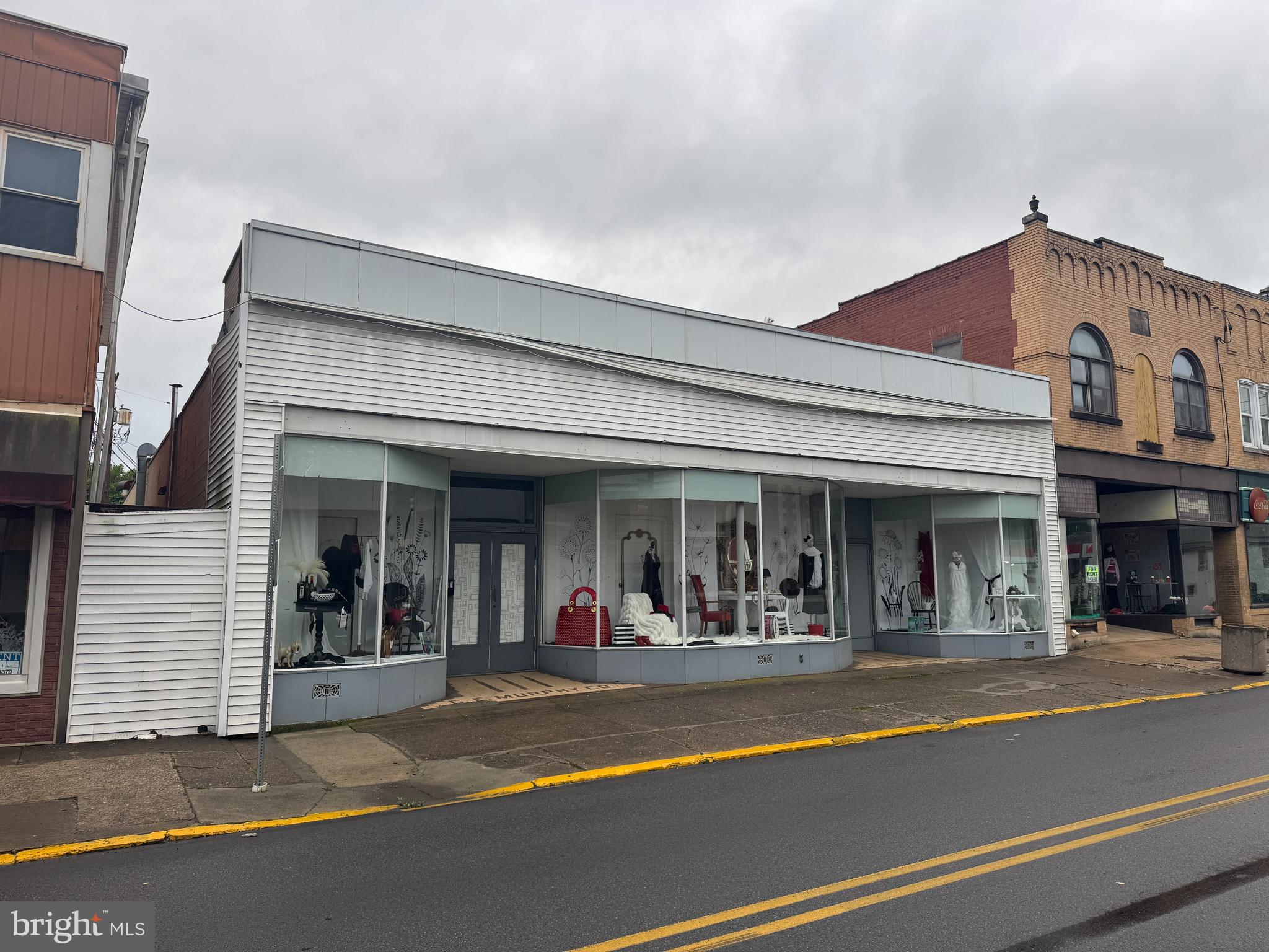 MINIMUM BID OF $50,000! INCREDIBLE COMMERCIAL OPPORTUNITY IN MOUNT UNION, PA! Unlock the potential of this impressive 24,000 sq ft commercial building, ideally situated on high-visibility W Shirley Street—just one mile off Route 522. This versatile property offers 12,000 sq ft on the main level and an additional 12,000 sq ft in the basement, providing ample space for a wide range of business ventures. Formerly used for industrial purposes, the building is perfectly suited for many uses. With four separate storefront entrances, it’s an ideal setup for multiple tenants or a thriving business hub. Whether you're expanding your operations or launching a new enterprise, this prime location offers outstanding exposure and endless possibilities. Don’t miss this rare opportunity to own a cornerstone property in Mount Union—bring your vision to life today! This property will be offered at auction on Thursday June 19, 2025 @ 3:00pm. The List price in no way represents a minimum, starting, or acceptable bid.
