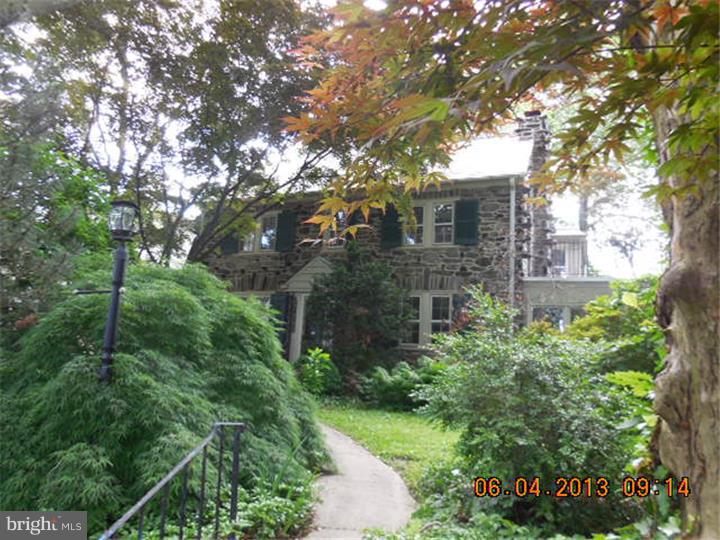 Here is a lovely 91+ year old three story home in a great Main Line neighborhood that is just waiting for the right owner. It still has many original features and distinctive touches. There is a fireplace on the first floor along with a built in bookshelf and china cabinet. There is also an exposed stone wall in the study behind the fireplace. There are lovely glass windows and doors to let in natural light all through-out the home. The sun room is a wonderfully open space with windows all around the room. This home also features lovely finished hard wood flooring throughout, along with ceiling fans in some rooms. The finished basement features half bath, laundry and living area. The spacious fenced-in backyard has a patio and detached garage. This is a great home, Make your appointment today! See attachment for PAS requirements and WFHM offer submittal information in MLS document section.
