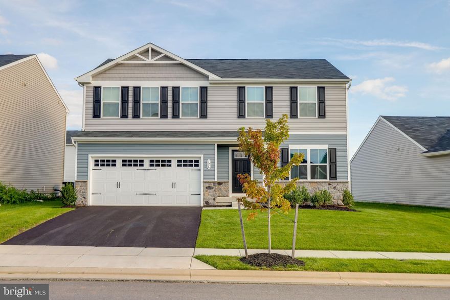 Welcome Home! Located in the newest and highly desired community in Taneytown, Meade's Crossing.   This is a 4 bedroom and 2.5 bath home with a 2 car garage.  Upon entry, the foyer leads into a great room that flows into a large open kitchen and dining space.  An island provides more work space and seating! Off the kitchen, the owner just had a stunning composite deck built.  This is the perfect addition to the home! Past the large pantry, a short hall leads to a convenient powder room, a large coat closet, and a flex room you can use any way you need a home office, hobby room, or extra play space. Upstairs you will find 4 large bedrooms, three of which have walk-in closets. The laundry room is spacious and also located on the upper level.  Off the light-filled upper hall, the owner's bedroom features a huge walk-in closet and a private full bathroom. 
The Homeowners Association offers a future pool, clubhouse, playground, tennis court, and walking trails! Don't miss your opportunity to make the beauty yours!!