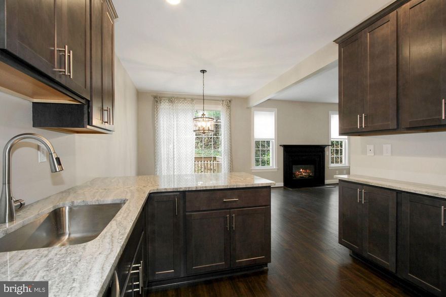 East of downtown just down the street from Longwood; the hidden favorite Longwood Village offers super EASY access to Route 1, yet within it's own charming & quiet community.  With lots of natural light and boasting a clean, modern aesthetic, this home has been fully leveled up with fresh flooring, sleek appliances, and granite counters that hit just right.  Basement has JUST been finished giving yet additional space for fun!  From the designer fixtures to the crisp cabinetry and new paint, every inch of this spot is giving immaculate vibes.  The location is a total flex, putting you within walking distance of your morning Starbucks, a late-night Wawa run, and essentials at Giant or TJ Maxx. When you aren't out exploring, you can kick back by the cozy fireplace or catch a breeze on the private (BRAND NEW) deck. Best of all, it’s peak easy living—the HOA handles the "adulting" chores like snow removal and lawn care, and there’s a massive unfinished basement to stash all your gear. Be ready to be impressed!  Seller is licensed real estate agent.