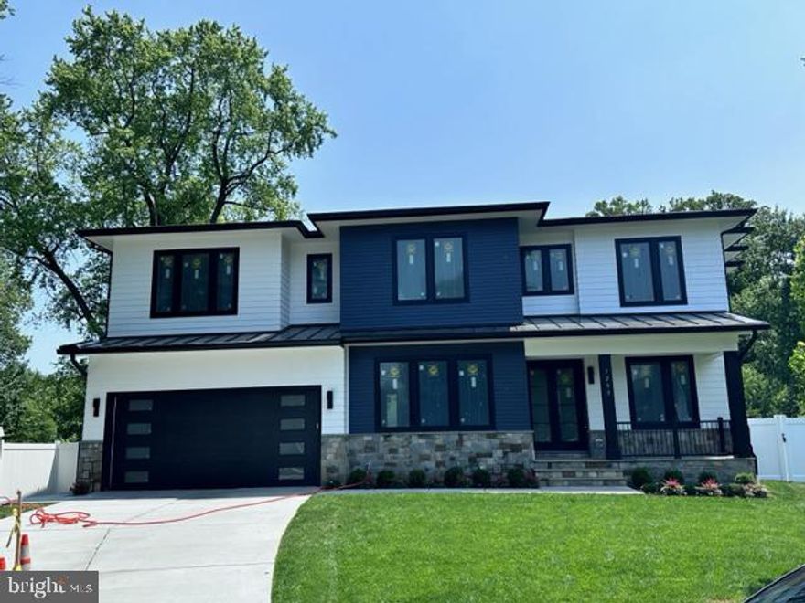 NEW CONSTRUCTION WITH DELIVERY IN JUNE AND APPT. ONLY  DURING CONSTRUCTION!

Welcome to the vibrant Olney Park neighborhood, where an exceptional opportunity awaits you. Presenting a magnificent modern/transitional new home built by DS Homes, Inc.  that is currently under construction but promises to be truly exceptional when complete. Loaded with quality details and craftsmanship, this home is designed to impress. Let's delve into the details of this remarkable residence which overlooks the tennis courts at Olney Park.

Bedrooms:
This stunning home boasts five spacious bedrooms, providing ample space for you and your loved ones to unwind and relax.

Bathrooms:
With five-and-a-half elegant baths, each with meticulous attention to detail, luxury and comfort are at the forefront of this home's design.

Open Floor Plan:
The thoughtfully designed open floor plan encompasses an office, a separate dining room, and a family room off the chef's kitchen. This seamless flow creates an inviting and functional living space.

Outdoor Oasis:
Step onto the stone-covered porch and into the meticulously manicured, fenced-in backyard, offering a private sanctuary for outdoor enjoyment and entertainment and backs up to the tennis courts at Olney Park.

Luxurious Primary Suite:
The upper level features an incredible primary bedroom suite complete with a coffee bar, private balcony overlooking tennis courts at Olney Park, and dual walk-in closets. The luxurious primary bathroom boasts dual vanities, a large shower with body sprays, a rain shower, separate handheld faucets, and a soaking tub under a picture window.

Additional Bedrooms and Baths:
Three other bedrooms and three baths on the upper level provide comfort and convenience for family members or guests. A laundry room is also conveniently located on this level.

Lower Level Retreat:
The walk-up lower level is an entertainer's dream, featuring an incredible bar, movie room, recreation room, and a 5th bedroom with a full bath.

Important to note, the 2 car garage door is a larger 18' .

Unparalleled Location:
Situated just minutes away from McLean and Tysons Corner, this home offers the perfect blend of tranquility and accessibility, with easy access to a multitude of dining, shopping, and entertainment options.

Completion Date:
While this exceptional home is currently under construction, envision the extraordinary home that awaits. The estimated completion date is June, ensuring a swift transition to your dream home.

Don't miss out on the chance to purchase this amazing home before it is complete! 
Note: This listing is under construction and available for viewing by appointment only until completion.