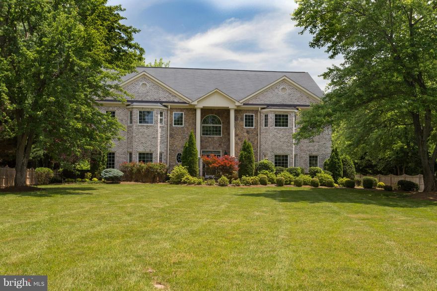 Stately and Elegant Custom Built Residence less than 10 yrs. old  and over 10,000 sq. ft.  Features:  fully gated, custom cabinetry, gourmet kitchen w/ butler s pantry, hand-finished hardwood floors, Italian ceramic floors, granite, coffered ceilings, extensive molding, 14 zone music system, addtl upper lever laundry, Italian marble floors, guest suite, home theater and exercise room.