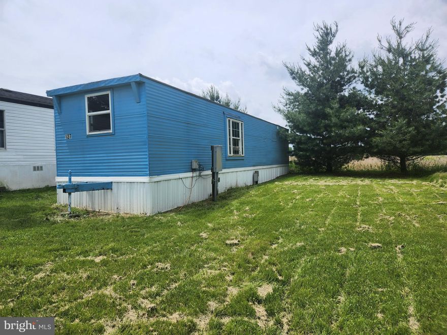 Nice trailer in Martinsburg features 2 bedrooms, 1 bathroom, living room, kitchen, small yard and parking.  Close to VA Medical Center.  Pets allowed on case by case basis.