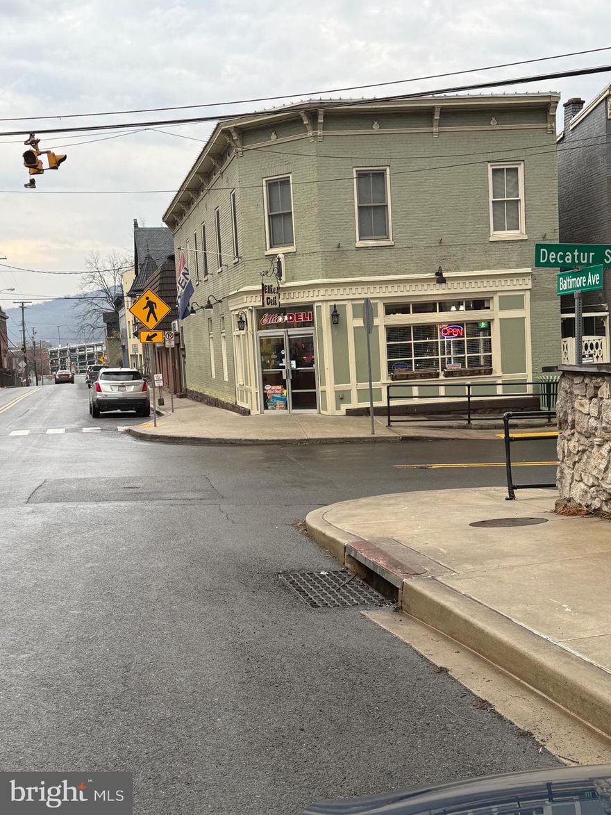 Building (with apartment tenant or empty) $285,000 Established Deli business available for $130,000 Additional. Package deal $415,000.  Very nice condition for retail/deli/take-out apartment upstairs is very nice and large with many windows. Seller may consider a lease or lease to own if you pay cash for the business. Business grossing about $12,000/week average in 2024. Seller will help with business transition and retaining current employees. Cumberland Manor apartments 101 Units is right across the street. Walking distance to VA Clinic, Social Security Offices and other hungry neighbors.