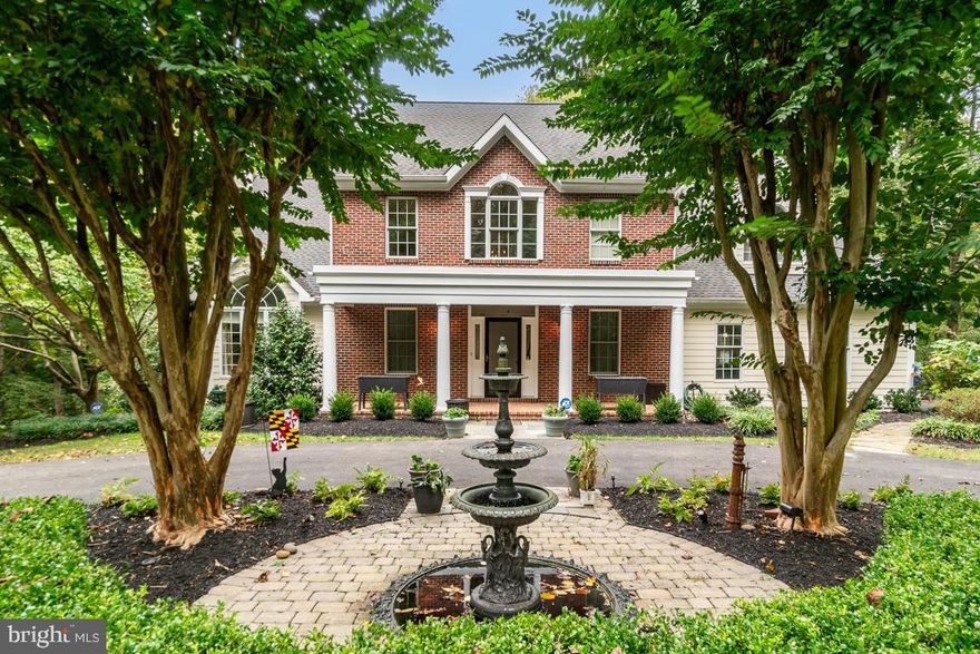 Beyond the gated entrance and private drive lined with an array of fruit trees, including apple, pears, peaches and figs, along with Holly, Magnolia, Crepe Myrtle and various other evergreens, sits this custom built traditional style home surrounded by 8.56 acres of woodlands!  Beautifully landscaped circular driveway leads to a covered front porch, alongside the home is a side-entry 2 car garage with new garage doors.  Step inside this distinguished residence you’ll find a grand circular staircase and two-story foyer, and an enormous atrium window transforms the space into a gallery of natural light.  Walnut hardwood floors with rich tones offer warmth throughout the foyer, dining room and two story living room.  Natural light pours into every corner of the space with expansive windows throughout the entire main level, also showcasing views of the surrounding woodlands.  The living room boasts a Harman pellet stove insert with wood mantel with decorative patterns, a wet bar rough-in, along with a balcony overlooking a tranquility garden with benches providing vantage points to enjoy the surrounding landscape, recently landscaped by Homestead Gardens.  The remodeled kitchen, with its thoughtful updates, wraps around the heart of the home, offering additional views of the surrounding woods through expansive casement windows, perhaps catching a glimpse of wildlife.  The wrap-around design maximizes both counter and storage space, and creates a functional and visually appealing layout, with natural tones and ceramic flooring, solid wood Kraftsmaid soft close cabinets, GE Monogram stainless appliances, including double ovens with convection, six burner gas stove, along with adjacent breakfast nook with large bay window.  The upper level boasts an owner’s suite with corner gas fireplace, vaulted ceilings, balcony, two large closets with custom Closet America systems, and en-suite full bath with jetted tub and separate shower.  There’s three additional spacious bedrooms on this level, one of which has access to the full hall bath.  The lower level walk-out basement provides an ideal space for entertainment and relaxation, featuring built-in cabinetry with drop-down projection screen and  built-in surround sound, along with a cozy gas fireplace.  There's an additional versatile and flexible space for sports tables, gaming tables, or possible in-home office.   Notable upgrades include brand new carpeting throughout, freshly painted, refinished hardwood floors, 40 year architectural shingle roof, dual zone HVAC 2014 with sanitizing UV light, Pella windows and french doors, hardi-plank exterior including reinsulated walls, underground sprinkler system, new Intex vinyl railings on balconies,  Rheem Marathon hot water heater, upgraded water conditioning system and new french drain system.