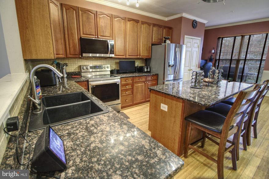 Discover an exceptional opportunity in the sought-after Whittier Pond community. This well-maintained interior townhome, built in 2004, offers 2,640 square feet of versatile living space designed for comfort, functionality, and everyday convenience. Its classic Colonial design provides timeless appeal, while the interior layout offers flexibility for a variety of lifestyles.

The main level features hardwood flooring in good condition and an open floor plan that creates a bright, spacious atmosphere from the living area through the dining space and into the kitchen. The kitchen includes generous counterspace, granite countertops, and newer stainless steel appliances. Its central location on the main level offers easy access to the rear deck, allowing for indoor-outdoor flow during meals, gatherings, or quiet time outside.

Off the kitchen, the deck provides a comfortable space to relax or entertain. Below the deck, a patio area adds an additional outdoor option and increases the home’s usable space. The lot size of approximately 0.04 acres offers a manageable outdoor area for simple upkeep without extensive maintenance demands.

The traditional layout of the home supports multiple interior configurations depending on the needs of the future occupants. With its generous square footage, the townhome allows room for living, dining, workspace, recreation, or additional storage. The frame construction and Colonial architectural style contribute to a durable structure suited for long-term use.

The Whittier Pond community is known for its well-kept surroundings and practical location. Green spaces, sidewalks, and nearby parks provide options for outdoor leisure. Residents benefit from close proximity to shopping centers, grocery stores, dining options, and local services. The neighborhood offers convenient access to commuter routes, connecting the property to a number of activity centers throughout the Central Maryland region.

The property includes off-street parking and available parking lot spaces, offering flexibility for residents and guests. There is no pool on the premises, simplifying upkeep and reducing long-term maintenance responsibilities.

This home’s location provides excellent access to a number of communities throughout Central Maryland, including Mount Airy (Mt. Airy), New Market, Monrovia, and Ijamsville. Its position within the Whittier Pond subdivision places it within reach of many of the area’s amenities and daily conveniences.

For buyers seeking a townhome with ample interior living space, outdoor options, and a location close to parks, shopping, and commuter routes, this property offers a practical and well-situated option. With its classic design, adaptable floor plan, and community setting, 2583 Carrington represents an appealing opportunity to own within a desirable and established area.

Schedule your showing to explore the full potential of this spacious property and the benefits of living in Whittier Pond.  Sellers have found home of choice and are ready to move.