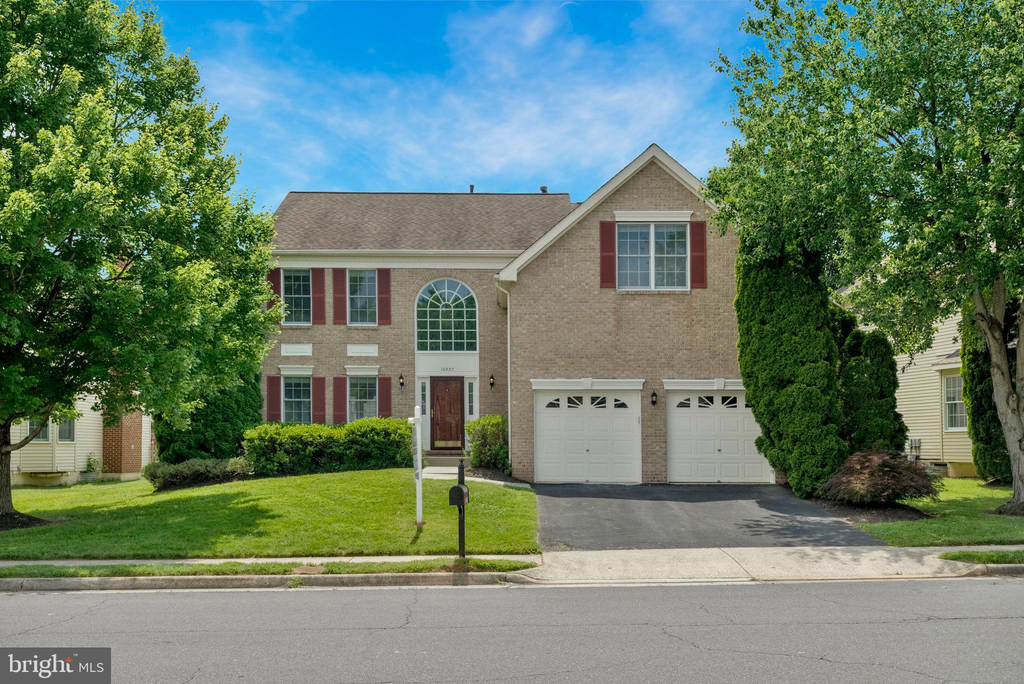 Nestled in the heart of the coveted Great Falls Crossing community, this flawlessly maintained home exudes elegance and offers a open floor plan designed for the modern lifestyle. Guests are welcomed into a grand two-story foyer, setting the tone for the light-filled, expansive interiors that await.
The formal living and dining rooms, adorned with rich crown molding, provide a sophisticated space for both intimate gatherings and grand entertaining. The chef’s kitchen is a true masterpiece, featuring a pristine center island, cooktop, double oven and a bright breakfast nook. This culinary haven flows seamlessly into the oversized family room, highlighted by a vaulted double story ceiling, skylights, and a cozy gas fireplace.
The upper level features 4 generously proportioned bedrooms, each bathed in natural light, as well as a luxurious primary suite that is the epitome of relaxation. This expansive retreat includes 2 walk-in closets with custom organizers, and a spa-like bath with vaulted ceilings, a soaking tub, dual vanities, a glass-enclosed shower, and a separate commode room.
The lower level continues to impress, offering soaring ceilings and an open layout perfect for a recreation or game room. Additionally, a well-appointed bonus room, currently used as a guest suite, is conveniently located adjacent to a full bathroom, providing privacy and comfort for visitors.
The oversized 2 car garage, offers ample storage space, with finished walls and custom flooring. The home’s roof was replaced in 2018, upper level furnace replaced in 2017. NEW Carpet, NEW Appliance, FRESHLY PAINTED!
An Unparalleled Location: Positioned just 2.3 miles from the Metro Station and within two miles of the vibrant Reston Town Center, this home provides unparalleled convenience with easy access to major thoroughfares, offering a seamless commute to Washington, D.C., Tysons, and Dulles. The Great Falls Crossing community boasts exceptional amenities, including a neighborhood pool, tot lot, basketball and tennis courts, and picturesque walking paths that connect to Reston Paths, Lake Fairfax Park, Watermine, and Lake Anne, providing a lifestyle of comfort and leisure.
