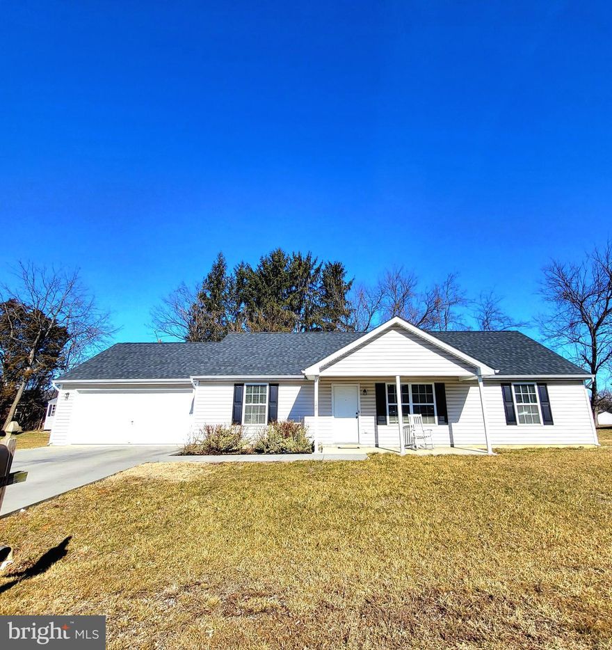 *NEW* PRICE DROP!! Like new, well- kept rancher in Westminster Heights! 3 Bedroom, 2 full bath, open floor plan! This home includes cathedral ceilings, laminate wood floors, ceramic tile, stainless steel appliances, front loading washer and dryer, walk in closet and more! Home is on a nice, flat and open lot with a walk out patio that backs up to a tree line. Plenty of parking with a 2- car garage and large driveway. NEW Privacy fence just added to back yard! Conveniently located near I 81, schools, restaurants and shopping. Very convenient for commuters that travel to Maryland, Virginia and Pennsylvania!