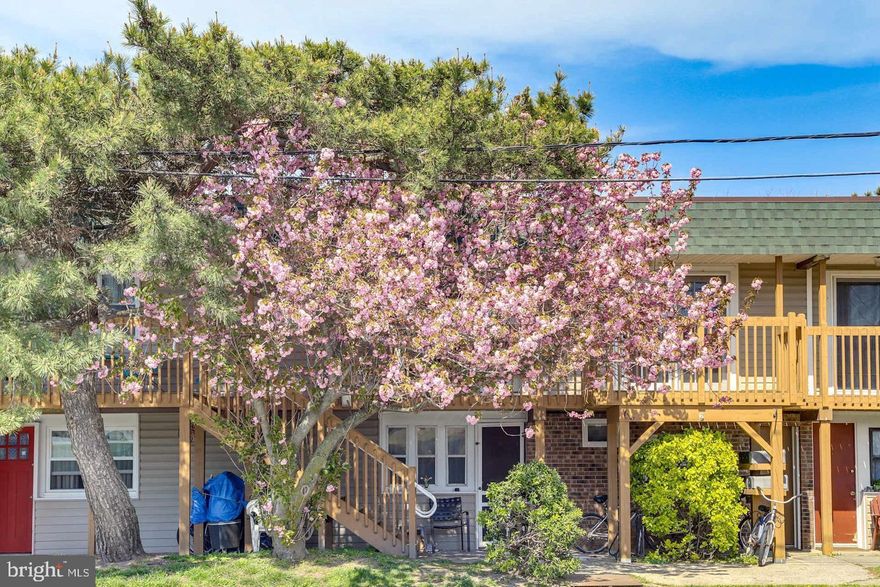 Discover this charming one-bedroom, one-bathroom condo that perfectly balances convenience with comfort in Ocean City. At 465 square feet, this thoughtfully designed space maximizes every inch while maintaining an open, airy feel.

The modern kitchen features sleek stainless steel appliances and elegant quartz countertops that catch the morning light beautifully. Rich wainscoting adds character in the kitchen/living room combo, creating visual interest and a touch of coastal sophistication. The primary bedroom comes complete with a luxurious king bed topped with a memory foam mattress, ensuring restful nights after busy beach days.

What sets this property apart is its prime location offering the best of both worlds. Positioned on the bay side, you'll enjoy peaceful water-view walks and stunning sunsets, yet you're just steps away from the vibrant beach and iconic boardwalk. It's like having a quiet retreat with an entertainment district practically at your doorstep.

The unit comes fully furnished with contemporary pieces, all less than one year old, so you can move in immediately or start generating rental income right away. Whether you're seeking a weekend getaway or an investment opportunity, this turnkey property delivers.

The surrounding area offers excellent amenities, including nearby Robin Park for outdoor recreation, convenient public transportation at the West Ocean City Park and Ride, and Rick's Market for all your grocery needs. Families will appreciate the proximity to Seaside Christian Academy.  Let's not forget Jolly Roger and Buxy's less than 100 steps from the front door of the condo!

This condo represents an exceptional opportunity to own a piece of Ocean City's coastal charm without the typical maintenance headaches of larger properties.