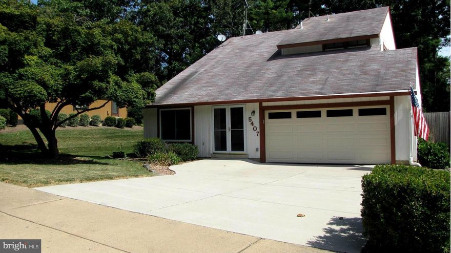 Welcome to this lovely, updated 3 level contemporary home!Enjoy the spacious screened porch in a private wood like setting.Back includes a deck w/hot tub.Gourmet kitchen boasts granite,stainless appliances, recessed lighting & beautiful cabinetry.On cool evenings, enjoy a fire in the spacious Family Room. HW flooring complement the Main Level. 1/4 mile to Metro Bus! One mile to VRE!