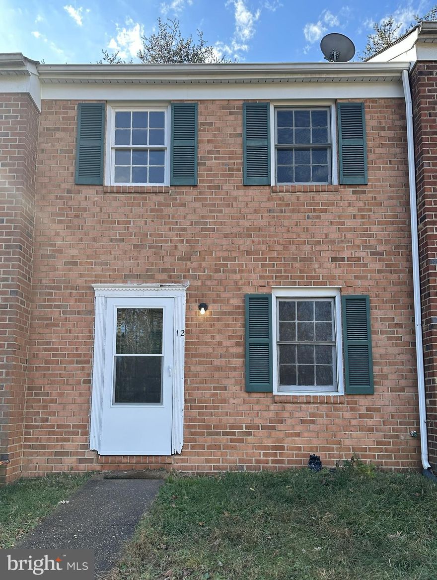 Newly Renovated Townhouse. New flooring, carpets, painting, kitchen and appliances remodeled. Move in ready. Convenient location to Downtown Fredericksburg. Combo box on front door.