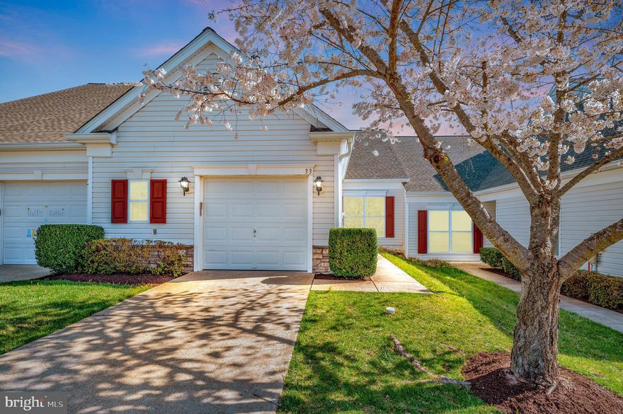 Nestled in the heart of the vibrant Villas at Falls Run 55+-adult community, this exquisite Crestwood model two-bedroom, two-bath villa awaits your arrival, offering the perfect blend of comfort, style, and convenience. Freshly painted in bright neutral tones and featuring all brand-new carpeting, this home welcomes you into a space where every detail is designed to cater to your carefree lifestyle. The modern, open-floor plan creates an atmosphere of warmth and openness.
Each bedroom is a retreat accompanied by spacious bathrooms that offer both privacy and comfort. The main bathroom upgrades include a sliding glass shower door, and both bathrooms include new decorator mirrors over the sinks. The heart of the home, the roomy eat-in kitchen featuring an updated stainless-steel refrigerator, is ready for your culinary adventures. The laundry room, conveniently located just off the kitchen, includes a high-efficiency Maytag washer and dryer. This unit also offers a sunroom, providing extra space and natural light. Other details include upgraded window treatments, ceiling fans and light fixtures throughout.

Not to be overlooked, this villa boasts a recently updated Trane HVAC system (4 years old) and hot water heater (3 years old), ensuring your home is the epitome of efficiency and reliability. 

Living in Del Webb's amenity-rich neighborhood means embracing a lifestyle where leisure and social activities flourish. Amenities include an indoor heated saltwater pool, an outdoor saltwater pool, tennis courts, pickleball, a fitness center, walking trails and clubhouse, making every day an opportunity to explore, connect, and enjoy. Here, community isn't just a word; it's a way of life.

This villa isn't just a house; it's a home waiting to be filled with new stories, laughter, and memories. Don’t miss your chance.