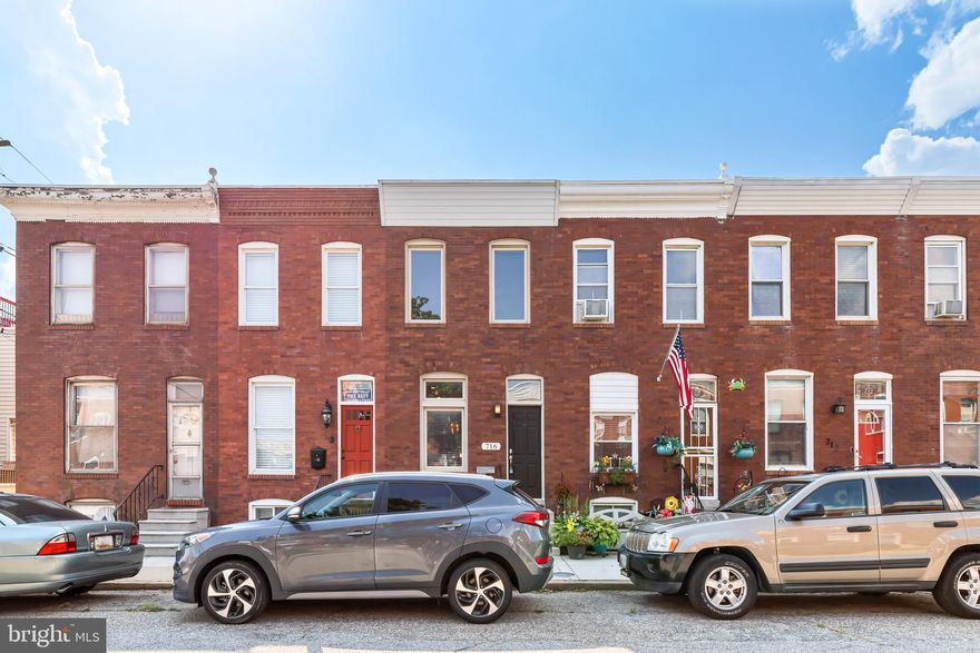 This beautiful Brewer's Hill rowhome boasts two bedrooms, two full bathrooms, a deck, a finished basement, and a parking pad! The open-concept main level is flooded with gorgeous natural light and features a spacious living room, dining area, and a gourmet kitchen with space for an island or additional dining space, plus a new dishwasher and refrigerator. Upstairs, each bedroom offers plenty of natural light and spacious closets, while the rear bedroom features access to a large deck, and the full hall bathroom boasts a shower and separate tub. Downstairs, the finished basement offers additional living space and another full bathroom. Don't forget the rear parking pad! There's nothing to do but move in!