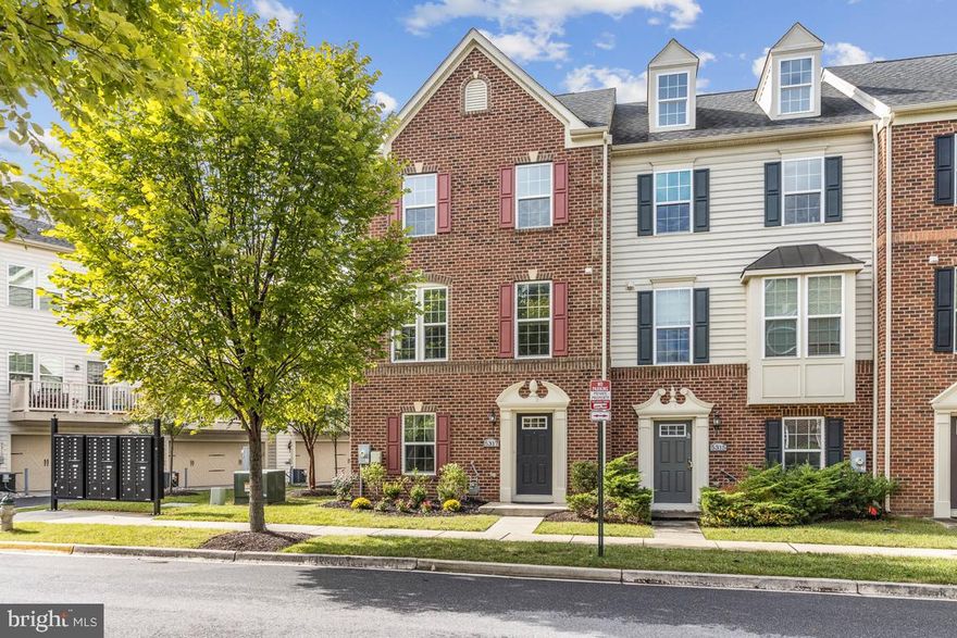 Beautiful light and bright end-unit townhouse in sought after Greenbelt Station. This 9 year old house has an entry level den/office/bedroom, full bath, large entry foyer and access to the rear 2 car garage. Main level offers an inviting open concept with views from front to back - large kitchen with white shaker cabinets, stainless steel appliances and large center island. Large dining area plus a seating or kids place space as well as front family entertainment space and powder room. Upper level offers 2 secondary guest rooms, upper level laundry and a great owners suite with large closets, primary bath with soaker tub, shower, double vanity and private water closet! Brand new carpet in bedrooms. This home is the one you've been waiting for!