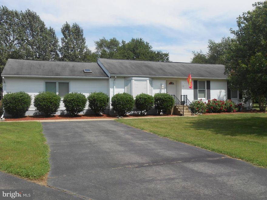 BEAUTIFUL best describes this sprawling 3 bedroom 3 full bath rambler. 24 x 24 finished garage, gas fireplace, hardwood floors, separate living room and family room. Sunroom walks out to a beautiful patio area into a screened in porch with a hot tub. The kitchen will blow your mind.  Lots of natural sunlight and a level 1.58 acre lot. Very nice .
