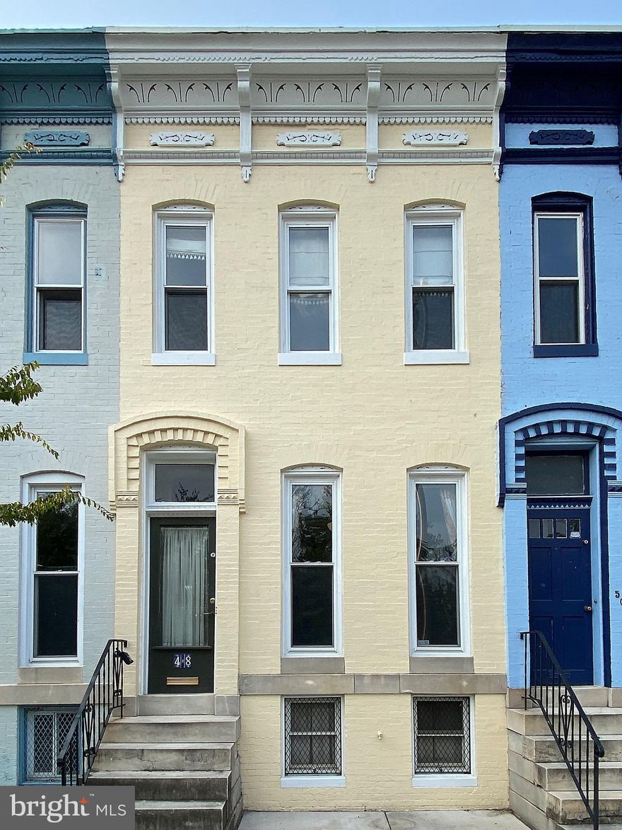 Circa 1889 Charles Village townhouse offers original details complemented by 21st century updates for comfortable living. Marble front steps, hardwood floors, built-ins, mantels, bay window, skylight. Gourmet kitchen featuring granite counters, custom cabinets, Thermador wall oven & cooktop with warming tray and JennAir refrigerator. Large front bedroom with built-in wardrobe. Luxurious tile bath with separate tub and shower. Bedroom level laundry. Rear office/guest room. Convenient to JHU Homewood campus, Penn Station, Union Memorial Hospital, shopping, restaurants, coffee shops and nearby Remington amenities. 1.5 blocks from 2 JHU Shuttle stops. Walkscore - 93, a Walker's Paradise. Property eligible for $14,500 JHU Live Near Your Work grant. Subject to CVCBD surtax - FY2021 = $135.