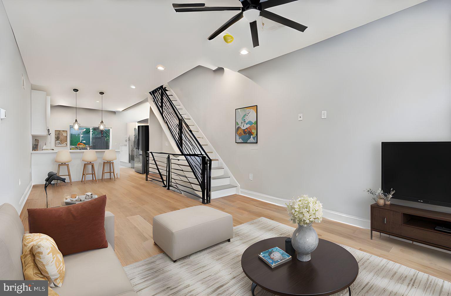 Open House on Saturday, June 28th 10:30 AM - 12:30 PM! One of the most affordable new construction 4 bed/3 bath houses on the market in Philadelphia! Use this opportunity to own where you live and ride the appreciation wave of the Norris Square neighborhood, which borders the hottest spots such as Fishtown & Olde Kensington! 10 years ago, those locations were underdeveloped. Now they are one of the hottest areas in Philadelphia. 1838 N 4th St is only 2 blocks away from the North American St., which is developing rapidly. You can find a bunch of cafeterias, pubs, businesses things to do .
The house itself is a spacious, modern four-bedroom property that sits on a wider lot than most others nearby, making it feel open, bright, and comfortable. Inside, you'll find stylish finishes throughout—luxury vinyl flooring, recessed lighting, and a beautiful kitchen with quartz countertops, a peninsula, shaker cabinets, and high-end stainless steel appliances.
The finished basement provides plenty of extra space for relaxing or working from home, complete with a full bathroom and natural light from a large window well. On the second floor, you'll find two generous bedrooms, a full bathroom, and conveniently located laundry. The entire third floor is dedicated to the primary suite, featuring tray ceilings, ambient lighting, two closets, and a private bathroom with a double vanity and glass shower.
Outside, enjoy a private fenced patio and rooftop deck with panoramic city views—the perfect place to unwind or entertain.
Compared to the other four-bedroom homes nearby, this property stands out for its spacious layout, modern finishes, and remaining years on its valuable 9-year tax abatement.