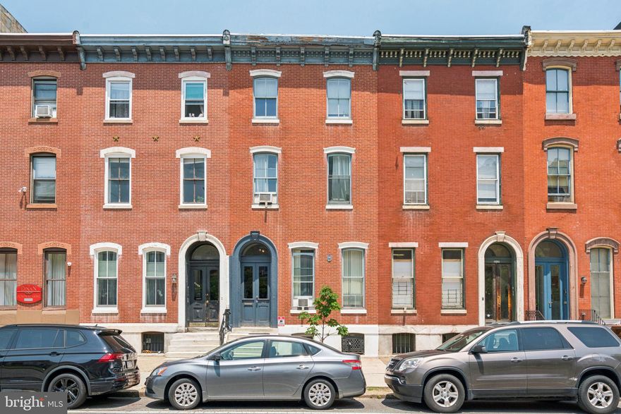 1917 Spring Garden Street is a fully renovated six-unit apartment building, except for one remaining classic studio unit, located on one of Philadelphia’s most iconic and historic corridors. The property features five spacious one-bedroom units and one classic studio (Unit #1), offering a diverse yet cohesive mix for tenants. In 2022, the building underwent approximately $200,000 in renovations, including a full overhaul of the common areas with new paint, carpeting, lighting, and mailboxes. Interior upgrades in the units include stainless steel appliances, quartz countertops, white shaker cabinets, in-unit washer/dryers, wood or luxury vinyl plank flooring, tile backsplashes, updated bathroom vanities, modern fixtures, and stand-up tile showers. The classic unit remains in clean condition and could be brought to the same finish level for an estimated $200/month rent premium. Mechanical and exterior updates include roof patching, cornice repairs, plumbing replacements, a new thermocouple, and water heater upgrades. The property also features one rear parking space and is ideally positioned just steps from the cultural and dining attractions of Center City.