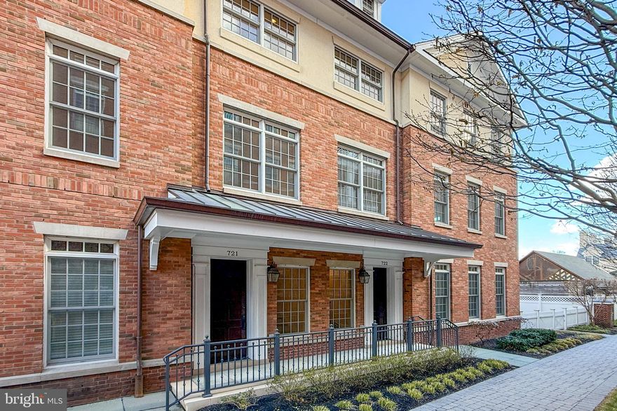 With a view of The Arts Council’s vibrant mural and festive lighting, this like-new Residences at Palmer Square townhouse basks in the buzz of city living. It is literally steps from Princeton’s word-class library, award-winning restaurants and an array of charming shops, yet treetop level bedrooms feel utterly serene. A pretty pathway guides you to a covered entrance, where a private elevator is ready to carry tired feet and bags full of fresh produce purchased at the weekly farmers’ market up to the Viking-equipped kitchen. Living spaces are lined with huge windows, including a versatile breakfast room and formal rooms divided by a double-sided, gas fireplace encouraging cozy nights in. A gracious staircase ascends to three luxuriously sized bedroom suites, each with custom organized closets and private bathrooms tiled in shades of cream and mocha. Crown molding and hardwood floors maintain a traditionally elegant aesthetic. A garage is on-site with reserved spots available, but in a location like this, you may find a car unnecessary! Some photos are virtually staged.