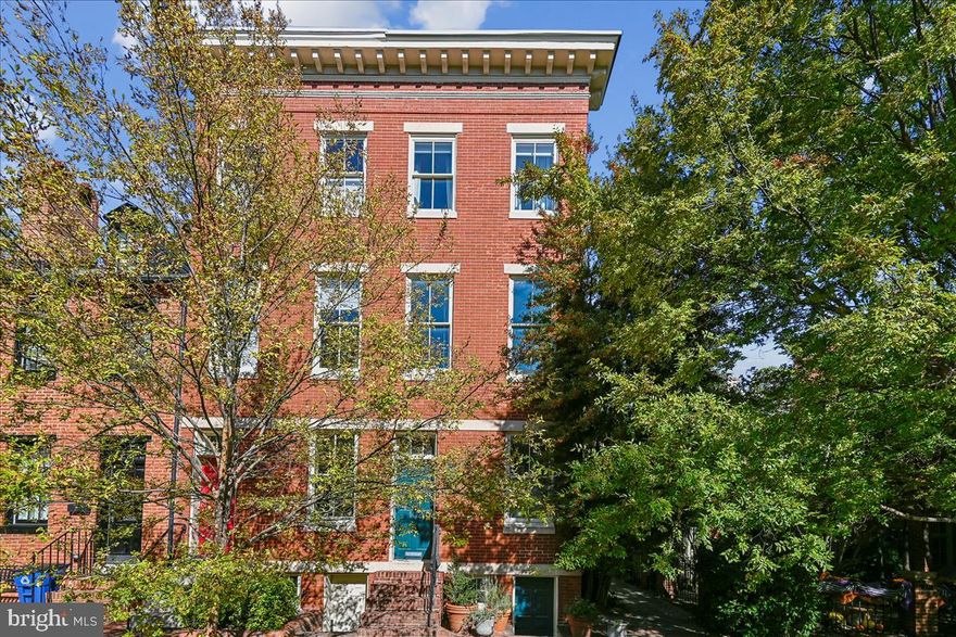 ***Stunning Home in Historic Otterbein Neighborhood***

Discover this stunning 3-bedroom, 2.5-bath home featuring a second-floor family room nestled in the friendly and sought-after Historic neighborhood of Otterbein. This residence has undergone a major renovation, skillfully designed by award-winning architect Rebecca Swanston, showcasing custom cabinetry and thoughtful design throughout.

Upon entering the home, you are welcomed into a perfect living room adorned with a cozy wood-burning fireplace, complemented by built-in shelving, coat closet and home office space. Check out the soaring wall of windows that opens to the inviting second-level family room. 

Step into the modern kitchen, where quartz countertops, custom cabinets, and stainless steel appliances create a culinary haven. The dining room flows seamlessly from the kitchen, enhancing the home's functionality. A conveniently located powder room on the main level adds further ease. Enjoy the beauty of hardwood floors throughout, creating a warm and inviting atmosphere in this sunny, light-filled residence.

The second floor boasts the incredible family room complete with a fireplace. There is also a full bathroom, and a comfortable bedroom #2 featuring a walk-in closet. 

Ascend to the third floor to find a spacious Primary bedroom, accompanied by a large privacy glass-walled full bathroom, alongside bedroom #3 which is complete with a built-in Murphy bed that allows for flexible space tailored to your individual needs.  

The lower level includes a separate entrance, providing abundant storage and endless customization possibilities. Additional features include a brand-new energy-efficient HVAC system installed in 2025, a new gas range added in 2025, a new washer in 2023, a new roof installed in 2021, and updated energy-efficient windows replaced throughout. 

The neighborhood boasts beautiful hidden pocket parks, perfect for relaxation, and a monthly neighborhood happy hour in the park that fosters a strong sense of community. You'll find yourself within walking distance to coffee shops, Federal Hill, Camden Yards, Ravens Stadium and the Inner Harbor, which is set for a major redesign in the coming years.

Situated on W. Lee Street, a wide, tree-lined street. The home features attractive mature landscaping and offers ample storage. Step outside to your peaceful and spacious shaded back patio, and for those seeking additional privacy, there’s a delightful rear deck located off the second-floor rear bedroom. This end unit, complete with a side entrance, is sure to appeal to entertainers and gardening enthusiasts.

Don’t miss the opportunity to make this exceptional property your new home!