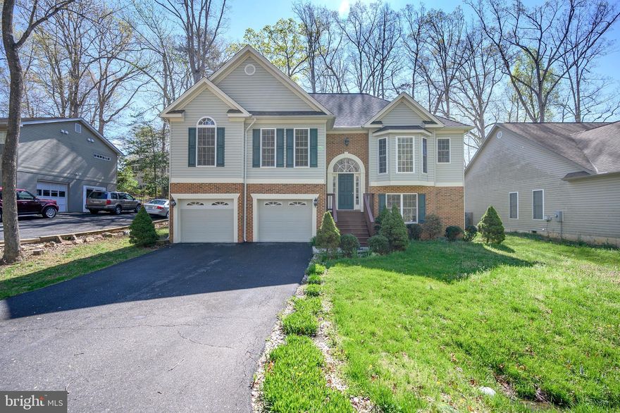 Situated close to the main gate with golf course views, you are welcomed by the stately brick accents of 623 Mt. Pleasant.  Once inside, you are delighted by the hardwood floors, cathedral ceilings and gas fireplace.  Enjoy  preparing meals in this stylish kitchen with stainless steel appliances,  ample cabinets, gorgeous counter tops, breakfast area, and pantry.  The dining room features a tray ceiling and a beautiful bay window.  You will love the master suite with sitting room and luxurious bath.   The lower-level is perfect with a light filled family room and bedroom with it's own private bath.  Relax on your deck and enjoy a private view of the  golf course.   A private, gated, secured community, Lake of the Woods offers anything and everything you could possibly want. Home to two lakes (the 550 acre main lake and a 35 acre "fishing lake"), a golf course, an equestrian center, a fire and rescue department, and a church all within the gates, Lake of the Woods simply has it all. Whether your passion is boating, water skiing, kayaking, golfing, horseback riding, or simply taking in the breathtaking views from the clubhouse while enjoying a fabulous meal, from your own deck or yard, or from one of the beaches, you won't be disappointed! Perhaps you'd like a game of bridge or volunteering your time and talents...Lake of the Woods offers more than 60 clubs and/or organizations from which you may choose to become involved. Located in Orange County, we are fortunate to enjoy low real estate taxes. Coupled with home prices ranging from the mid-$100,000s to over $2,000,000, Lake of the Woods is the perfect community for both full-time residents, as well as weekenders. But don't take my word for it, please come see for yourself! I will gladly give you a tour of Lake of the Woods by boat and by car so that you may experience why I love Lake of the Woods!