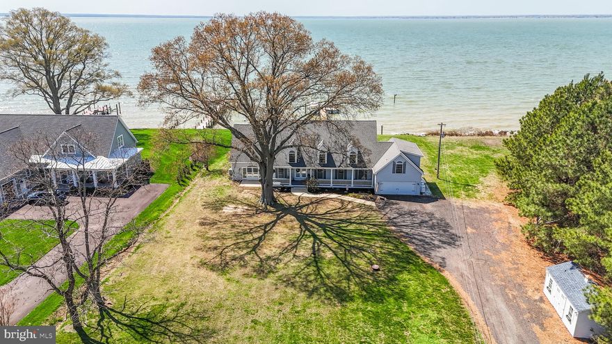 If you’re seeking an exquisite waterfront retreat, this Potomac River diamond delivers: a custom Cape Cod with approximately 125 feet of pristine waterfront and drop dead sunset views. Featuring primary living on the main level, a renovated primary bathroom with a soaking tub , separate shower , handcrafted tiles, home office/ or bedroom, hardwood floors, and an open-plan layout, ideal for entertaining. Highlights include gorgeous natural lighting in every room, soaring ceilings, an indoor tiki bar set inside a parlor/game room, with lots of flexible upstairs spaces to include a sitting area , an additional bedroom, loft and a separate two-entry apartment, with a kitchenette, full bath room , a new sun deck and stairs , with a strong Airbnb potential. Numerous upgrades abound—tinted riverside windows, new fans and lighting, gas logs, all-new stainless steel appliances, new washer/dryer, a new deck trex( waterfront) , a 12,000-watt generator, hot-water heater, vapor-sealed crawlspace with new insulation and dehumidifier. Outside you’ll appreciate the 130-foot pier with electric and water, plus a jet ski lift and a 10,000-lb boat lift! While you’re watching those gorgeous sunsets, you can sit back in your brand-new 16-foot Michael Phelps swim spa! As you visit this home, the pride of ownership shines on each and every floor. This home is located near Swan Point where you can enjoy a round of golf or a seafood dinner at the yacht club , with the added bonus of Fourth of July fireworks over the water from Cobb Island or Colonial Beach. Approximately 70 miles to Washington DC. And approximately 19 miles to Virginia!