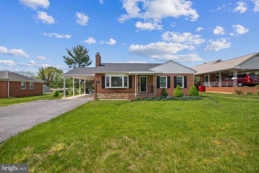 For more information contact co lister! Well-maintained all-brick rancher 🧱 in a convenient Hagerstown location—just minutes from shopping centers, restaurants, parks 🌳, and major commuter routes. The main level offers three comfortable bedrooms, a full bath, natural hardwood floors throughout and a cozy stone fireplace in the living room.

The kitchen features generous cabinet and counter space with access to both the backyard and lower level. Downstairs includes a spacious family/rec room with walkout access and a large unfinished area with laundry and a half bath.

Enjoy the flat, spacious backyard with a concrete patio—ideal for outdoor entertaining. There are multiple sheds for storage and plenty of parking with an attached carport, paved driveway, and an additional covered parking area 🚗.

Additional highlights include a newer roof (2019), recessed lighting and true pride of ownership throughout—solid, clean, and move-in ready ✅.