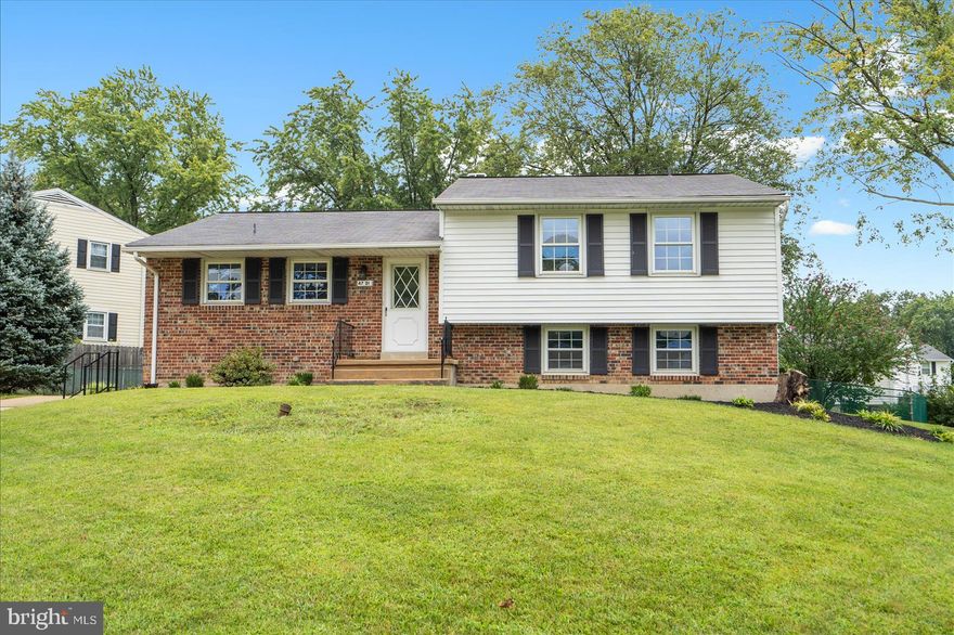 Come and see this wonderful spacious home with many updates such as new appliances, carpet, tile,  and baths. The main level boasts a large living room with hardwood floors to the formal dining room, the  kitchen has  stainless steel appliances, granite countertops and wood cabinets. The upper level  displays two full baths and three spacious bedrooms (including the master suite) with built-in cabinets & hardwood floors,  The upgraded master bath has dual vanity, new tile floors and walls. The fully finished basement consists an enormous family room and a full bath. Home is located near schools and has easy access to shopping and restaurants,