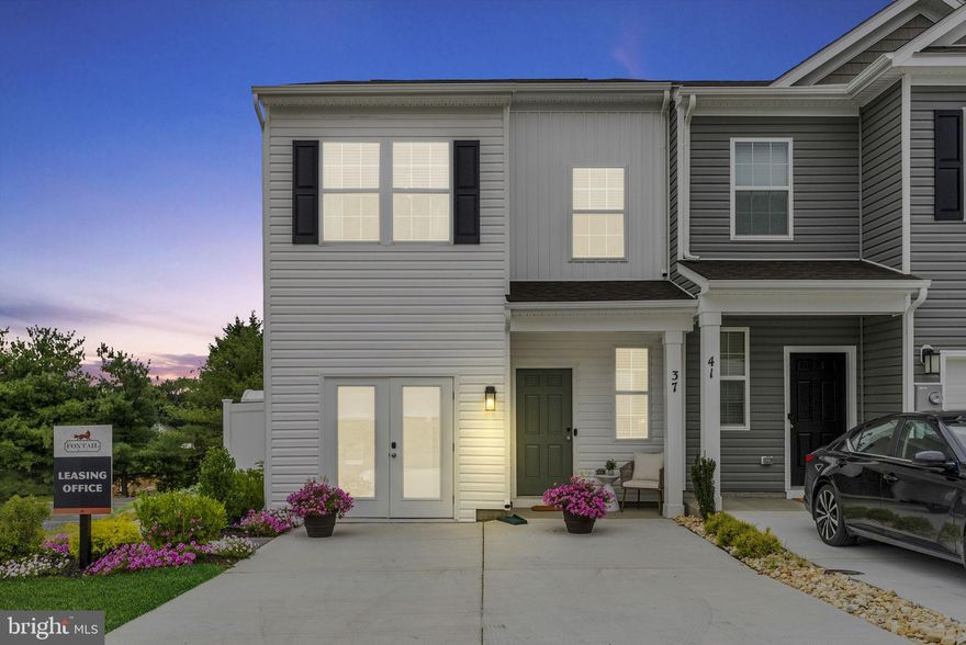 Newly built 3 BR 2.5 BA townhomes for rent!  Nestled in the heart of Martinsburg, WV, Foxtail Mills offers the perfect blend of comfort, style, and convenience - creating the ideal setting to flourish.  Imagine cozy mornings in your beautifully designed home, featuring modern kitchens with sleek countertops, spacious living areas bathed in natural light, and elegant finishes that set the stage for unforgettable moments.  In the evenings, take a stroll through nearby parks, explore charming local boutiques, or enjoy a candlelit dinner at one of Martinsburg’s delightful restaurants.  Whether you're sharing quiet nights at home or discovering the vibrant local scene together, Foxtail Mills is where community and luxury intertwine.  Every home at Foxtail Mills has upgraded interior finishes, including stainless steel appliances and spacious closets.  Step outside your home and enjoy your spacious backyard, attached garage, and more.  Martinsburg offers history, adventure, and charm.  Explore the Belle Boyd House, hike Yankauer Nature Preserve, or shop and dine downtown.  Enjoy local wines at Taylor’s Farm Market or catch a show at the Apollo Civic Theatre.  End unit townhomes ($2,300/mo.) and interior unit townhomes ($2,100/mo.) are available now or coming soon, inquire with leasing office staff in model home (323 Bedington Rd) about specific delivery dates.  All photos were taken of the furnished and decorated model home/leasing office for the community.  Rental townhomes in the community will be the same Delmar floor plan as the model, with the same appliances and fixtures, but are leased without furniture or decor.