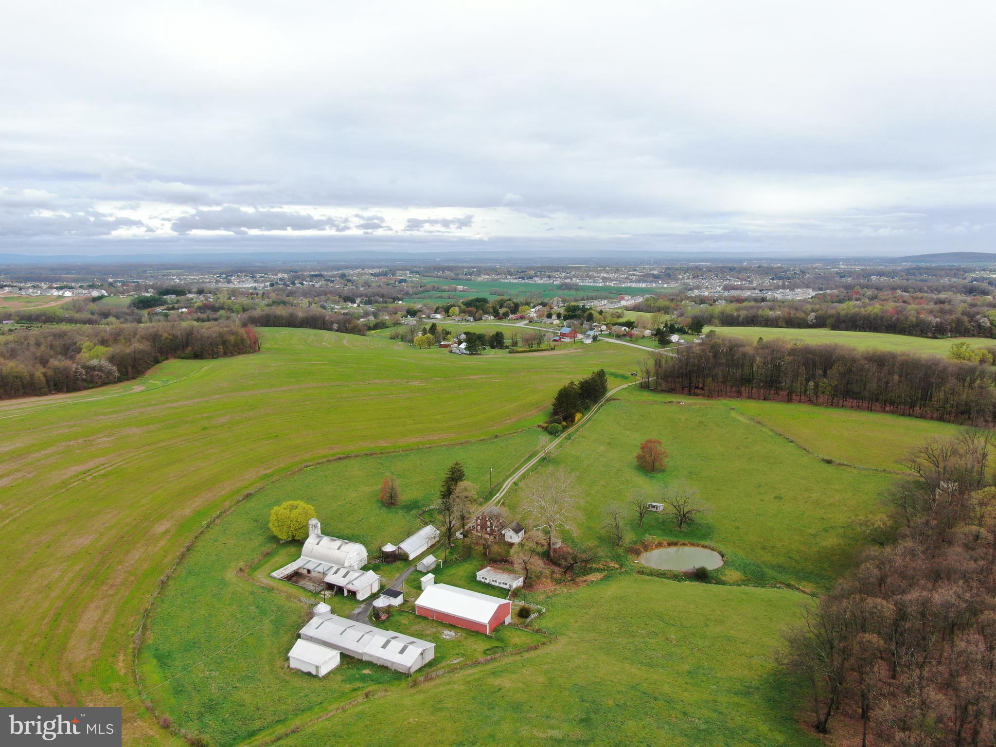 Incredible 231.39± Acre York County, PA farm to be offered in 6 tracts, combinations of tracts, and as a whole! This farm has been in the same family for over 75 years making this a once in a lifetime opportunity! The farm lays nice and features approx. 175± acres tillable. Conveniently located off Rt 94 in Hanover, PA, the property is minutes from 194, 97, and approx. 10 miles from Rt 30. The property will be offered in 6 tracts, combinations of tracts, and as a whole.
Tract 1: 53.96± acres with a 4 bedroom, 1 bath farmhouse, beautiful pond, and farm buildings. Farm buildings to include a 40x70 pole building w/ concrete floors, electric, water, and large overhead and sliding doors, 21x40 workshop w/ electric, 20x23 2 car garage w/ 20x38 attached storage, 9x15 milkhouse w/ water and electric, milk tank has been removed, 10x18 garage, 32x106 equipment shed, 46x52 barn w/ loft and concrete barnyard, 19x30 equipment shed, corn cribs, and more.
Tract 2: 28.4± Acres with frontage on Fuhrman Mill Rd.
Tract 3: 31.02± Acres with frontage on Pleasant Hill Rd.
Tract 4: 67.92± Acres with easement access through a private road from Pleasant Hill Rd.
Tract 5: 34.89± Acres with frontage on Pleasant Hill Rd.
Tract 6: 15.2± Acres with frontage on Fuhrman Mill Rd.
The property is in clean and green. Come and bid on one tract, multiple tracts, or all of them!
This property will be offered at auction on Thursday, June 27, 2024 at 1PM.
The List price in no way represents a minimum, starting, or acceptable bid. It is used only as a guide to find the property.