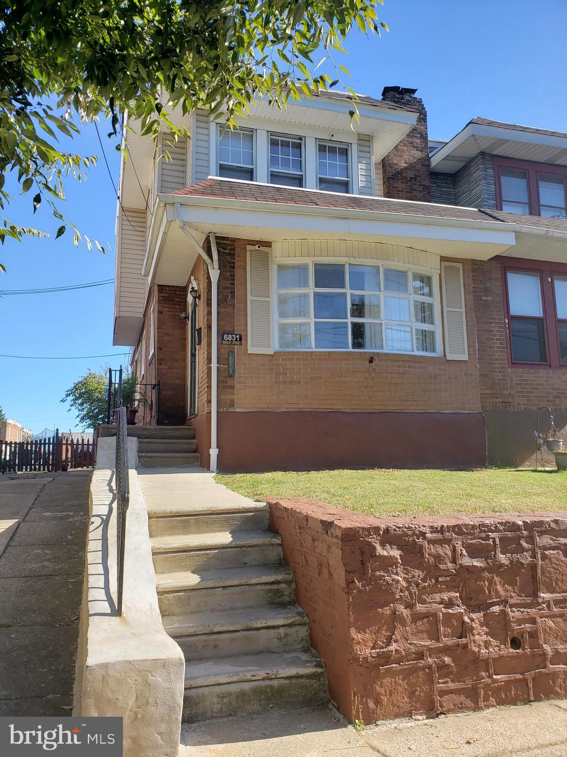 Grand location on a wide street in a quite neighborhood offering suburban ambiance and lifestyle yet with a city address and all its conveniences. 6831 Oakley offers a heated enclosed front porch with a large bay window making the space bright and sunny and offers livable square footage. There is a front and rear yard to enjoy the outside space. This wide twin has newly installed vinyl plank flooring throughout the first and second floors . The spacious living room and dining room flow together and offers great space for gatherings. The kitchen , recently remodeled has a breakfast bar and a 6 burner stove with exterior exhaust. The kitchen rear exterior door walks out on to a deck which is great for outdoor living relaxation. It steps down to a fenced grass backyard with gate excess to the front and a storage shed. There is rear yard access to the basement as well. Inside access to the basement is located in the kitchen, descend the stairs to an entire level of usable living space. This main living space offering multiple uses and is complete with a full bath with large walk-in shower. There are 2 windows providing daylight which make the space bright and livable. In addition to this space, there is a utility room with possible storage space and a good size laundry/storage combo work room. Return to the living room where a wrought iron bannister leads to the 2nd floor. Here you will find 3 good sized bedrooms offering quiet retreats for it's occupants and a convenient hall bath with tub and shower and linen closet. The middle bedroom was built with a bump out: making this room larger then other houses on the street. Call for a showing now and experience for yourself the charm of this well maintained, move-in ready and tastefully decoration twin, Located in the desirable Lawndale section of Philadelphia - where city life and suburban relaxation blend perfectly.