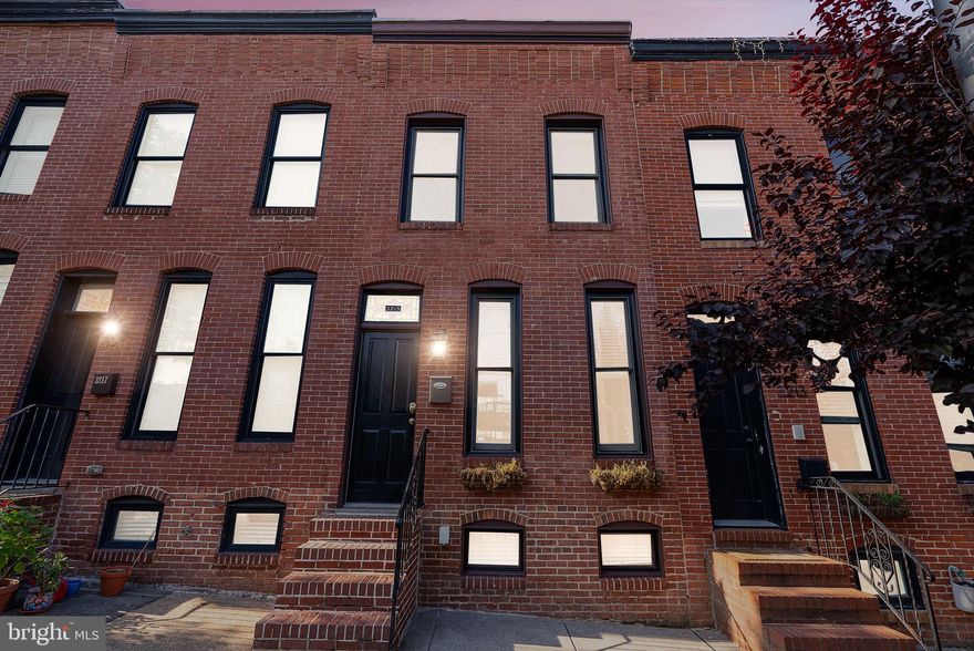 This house checks all boxes,  Parking Pad+Rooftop Deck+3 Bed/3 Bath home = Amazing! Main level includes Living room, Kitchen w/granite counter & stainless steel appliances and sep Dining room. On the upper level are 2 Master Bdrms ea w/private Baths & walk-in closets. Lower level find the 3rd Bdrm or Fam room & full bath. Head up to the Rooftop deck for stunning views of Charm City.