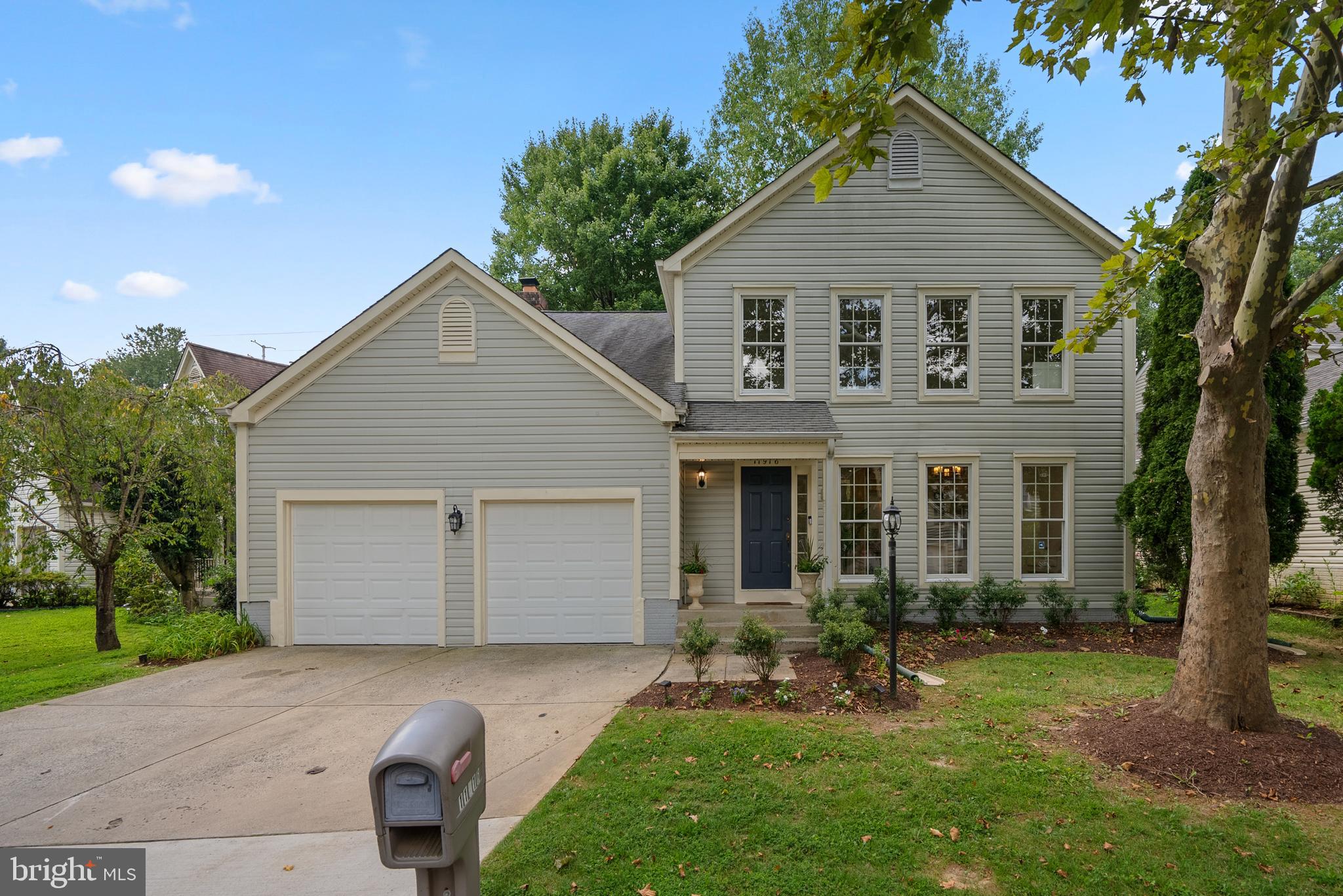 This four-bedroom, three-and-a-half-bath home combines refined finishes with comfort. Its inviting curb appeal and serene setting near open space are immediately captivating.
The remodeled kitchen, a true centerpiece, boasts stainless steel appliances, granite countertops, white cabinetry, and a sunny breakfast area. The adjoining family room, with wood burning fireplace is filled with natural light and is perfect for gatherings. Upstairs, the primary suite features a spa-inspired bathroom with a Hansgrohe Raindance Shower System, wainscoting, and an Elfa custom closet. Three additional bedrooms on this level offer ample storage and natural light.
Brazilian cherry hardwood floors grace the upper two levels, while the finished lower level provides flexible space for a recreation room, home gym, or guest accommodations. The large garage offers ample storage, and recent upgrades like a new HVAC system and water heater ensure peace of mind.
Located in the coveted Potomac Ridge, this home offers privacy and convenience, just moments from shopping, dining, and major commuter routes