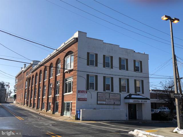 Great small office suite with huge windows. Located in heart of Downtown Westminster. Public surface parking lot and large garage behind building. Great value. Signage