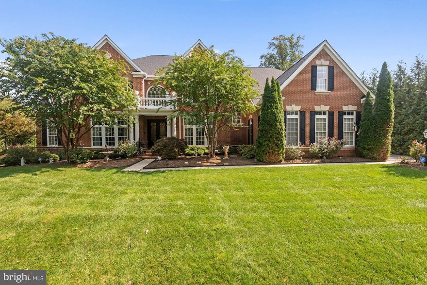Welcome to 1361 Hardison Lane! Upon arrival, this stately, 10,010+/- sq ft, 7 bed, 6.5 bath, three-sided brick home quickly captures your attention with the beautifully manicured lawn and bronze french doors. Guests are greeted with a stunning entryway featuring a marble foyer, palladian window, grand bifurcated staircase, and crown molding galore. On the main level, you will find multiple sitting rooms, including a sunroom with wooden plantation shutters, a large executive office, a dining room with a beautiful chandelier, and a gourmet kitchen with stainless steel appliances. On the upper level, you will find six bedrooms and five full bathrooms including the primary suite bedroom which boasts a large sitting area, primary bath with spacious soaking tub, and a huge, recently upgraded walk-in closet (2021). The expansive finished basement offers a home theatre system, gym, full bedroom and bathroom, kitchenette, playroom, and 2 storage closets all with recessed lighting. The three-car garage, irrigated garden and lawn, rear stone patio, and large, fenced backyard are just a few of the many outdoor features this home has to offer. Among the many upgrades include an NVR alarm system (2021), surveillance cameras (2021), HVAC systems (2018-2021), recently replaced roof and gutters (2021), and more! Experience luxury living in Bellmeade II HOA in this exquisite home conveniently located within 10 minutes of Tysons Corner and 25 minutes to Washington DC.