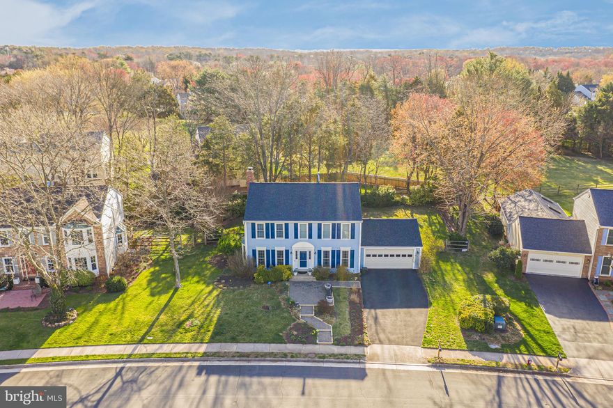 OFFER DEADLINE UPDATE  7PM SATURDAY 4/12. 
Welcome to this exquisite Annapolis model by NV Homes, nestled in the highly sought-after community of Sully Station II. This residence is set amidst beautifully landscaped grounds, thoughtfully designed with vibrant plantings that offer a dynamic display of color and texture throughout the seasons. A gracefully designed front walkway and patio provide a warm, inviting entrance.
Upon entering the foyer, you’ll be immediately captivated by the elegant hardwood floors that flow seamlessly throughout the main level, complemented by coordinating Porcelain plank tiles in the kitchen and family room, enhancing both the beauty and practicality of the home. The home's color palette exudes warmth and sophistication, with several freshly painted areas adding a contemporary touch.
The formal living and dining areas, located at the front of the home, are generously proportioned to accommodate festive gatherings, while the family room and kitchen, situated at the rear, offer direct access to the screened-in porch and patio, creating an ideal space for relaxation and outdoor living. The family room showcases a beautiful brick gas burning fireplace with custom built in’s on either side, perfect for displaying your treasured items and practical concealed storage.
The gourmet kitchen has been fully renovated, featuring high-end cabinetry in a warm white finish, complemented by luxurious honed granite countertops and a tasteful backsplash. Stainless steel appliances, including a gas cooktop, further elevate the space, while the open design seamlessly connects the kitchen to the casual dining area and family room, offering a true open-concept living experience.
Conveniently located just off the kitchen is the laundry room, which provides access to the spacious two-car garage, while a  renovated powder room off the center hall adds to the home's functionality.
Upstairs, the residence is outfitted with newly installed plush carpeting. A beautifully updated hall bath serves the three secondary bedrooms, while the primary suite boasts soaring vaulted ceilings, ample closet space, and an updated bath featuring a separate soaking tub, double vanities, and a walk-in shower.
The fully finished lower level offers a variety of spaces, ideal for media viewing, a workout area, or hosting overnight guests. An updated full bath further enhances the lower level's versatility, and a generous storage room is available for all your organizational needs.
The serene, mature landscaping surrounding the property provides a peaceful retreat, while the newly fenced, expansive backyard is perfect for children and pets to enjoy.
This home is part of two well-regarded HOA associations: Belle Pond Farm and Sully II. The Sully II HOA offers a range of amenities, including trash collection, tennis courts, a community pool, and a playground, while Belle Pond Farm focuses on the maintenance of common areas. The location is also highly desirable, offering convenient access to top-rated schools, shopping, dining, healthcare, and more.
With its tranquil setting, this home provides the perfect balance of peaceful living and proximity to everyday conveniences. Welcome to your new home!Seller prefers to close Mid- May with a rent back for 30 days.
Updates: Water Heater 2024
Roof replaced approx 2021
HVAC approx 2021
Driveway approx 2022
Kitchen remodel 2019
Renovated powder room 2020
Completely renovated basement bathroom 2025
Screened in porch 1997
New windows throughout 2022
New Front and back storm doors  2022
New French door to porch 1997
Updated upper hall bath 2011
Fresh paint in much of the home 2022-2025
Fenced replaced approx. 2014
Upscale landscaping throughout ongoing 2025
Lead walk and patio entry -new pressure treated wood framing 2024 
Rear paver patio- brick & sand added 2024