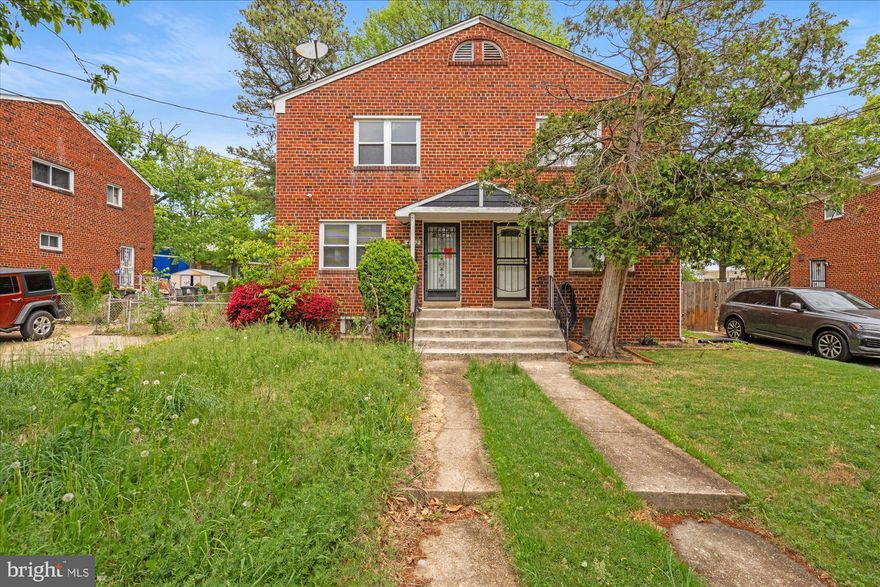 Opportunity knocks—perfect for investors or buyers looking to add value and build equity. This semi-detached 3-bedroom, 1.5-bath home offers solid bones and a functional layout.

Features include hardwood floors throughout, a spacious eat-in kitchen with direct access to an expansive backyard, and a traditional living and dining area. The partially finished lower level provides additional space with potential for customization—ideal for creating added living area, a home office, or rental flexibility.

Conveniently located just minutes from Marlow Heights Shopping Center and Giant Food, with easy access to Interstate 495 for commuting. A strong value-add opportunity in a well-connected location.