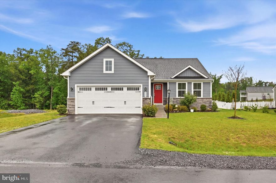 Move-in ready and loaded with upgrades, this beautifully ranch-style home offers the perfect blend of modern comfort, style, and convenience, all on one level! Freshly painted with brand-new carpet and luxury vinyl plank flooring, this home is ready for its next owner to move right in and enjoy. Featuring 3 bedrooms, 2 full baths, and 1,576 finished square feet above grade, the open-concept layout creates an inviting space ideal for both everyday living and entertaining.

The spacious kitchen showcases granite countertops, stainless steel appliances, a center island, and seamless flow into the dining and living areas. The primary suite features a private ensuite bath with tile flooring and tiled shower surround, while both bathrooms offer stylish tile finishes. Main-level laundry adds to the home's functional design and everyday convenience.

Step outside to enjoy the rear deck overlooking the fenced backyard backing to trees, creating a peaceful outdoor setting with added privacy. The full unfinished basement with bath rough-in provides excellent potential for future living space, recreation area, home gym, storage, or guest space. Complete with a 2-car garage and conveniently located near commuter routes, shopping, and dining.

Additional recent improvements include professional whole-home cleaning and professionally cleaned ductwork, offering added peace of mind and a truly fresh start for the next owner. Why wait to build when this like-new home already has the upgrades done for you?