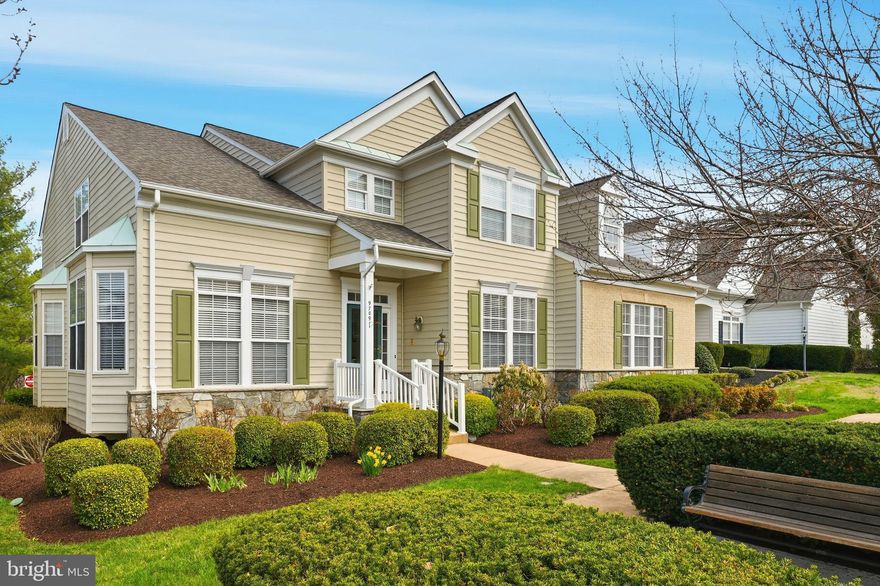 This immaculate former model home by Brookfield Residential showcases timeless craftsmanship with intricate ceiling details, extensive trim work, and gleaming hardwood floors throughout the main living spaces. Every inch of this home reflects thoughtful design and meticulous care.

The main level offers true one-level living with two spacious bedrooms and two full baths, including a serene primary suite as well as main floor laundry. Upstairs, you’ll find two additional bedrooms, a full bath, and an open loft—perfect for guests or flexible living space. Currently being used as a craft room with additional cabinetry, lighting and countertops.

The fully finished basement is an entertainer’s dream and a rare find—featuring a stunning private office with custom built-in shelving and dual workstations, a wine cellar accented by wrought iron gates, and an expansive recreation area complete with a wet bar, second refrigerator, sink, and ample cabinetry. A half bath and a large den or exercise room with floor-to-ceiling mirrors complete this incredible lower level.

Step outside to a beautifully landscaped backyard retreat with a covered patio—ideal for relaxing or hosting gatherings in a peaceful, private setting.

Recent updates include 2019 architectural shingled roof, 2016 Trane HVAC and 2015 hot water heater replacement, plus a new dishwasher and microwave, offering peace of mind for years to come.

Residents of Dunbarton enjoy access to a 21,000 sq. ft. clubhouse with indoor pool, fitness center, billiards, and a grand ballroom, along with additional amenities throughout Braemar including walking trails, pickleball and tennis courts, bocce, and more—all with HOA-covered lawn care, trash service, and cable/internet.